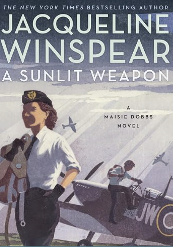 Book cover for 'A Sunlit Weapon' by Jacqueline Winspear showing a woman pilot in uniform with aviator sunglasses, a flight jacket, and a cap, standing beside a military aircraft with other pilots in the background.