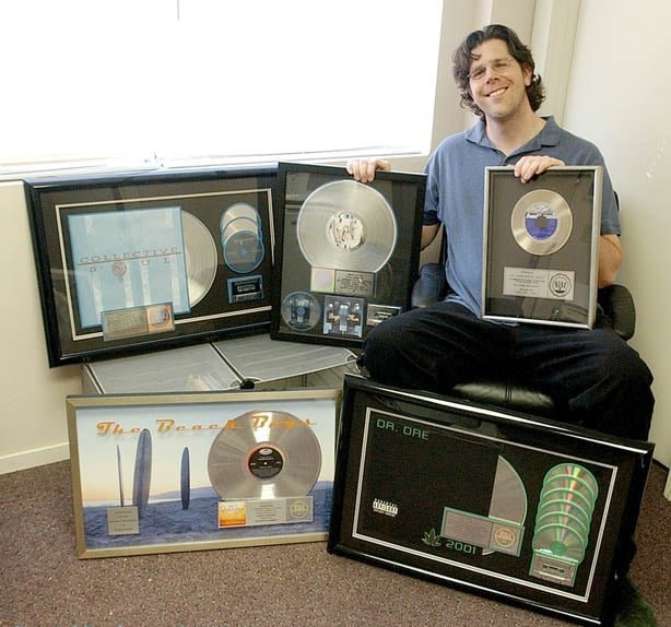 Tom Gordon Shows Off Plaques For His Work On Major Records
