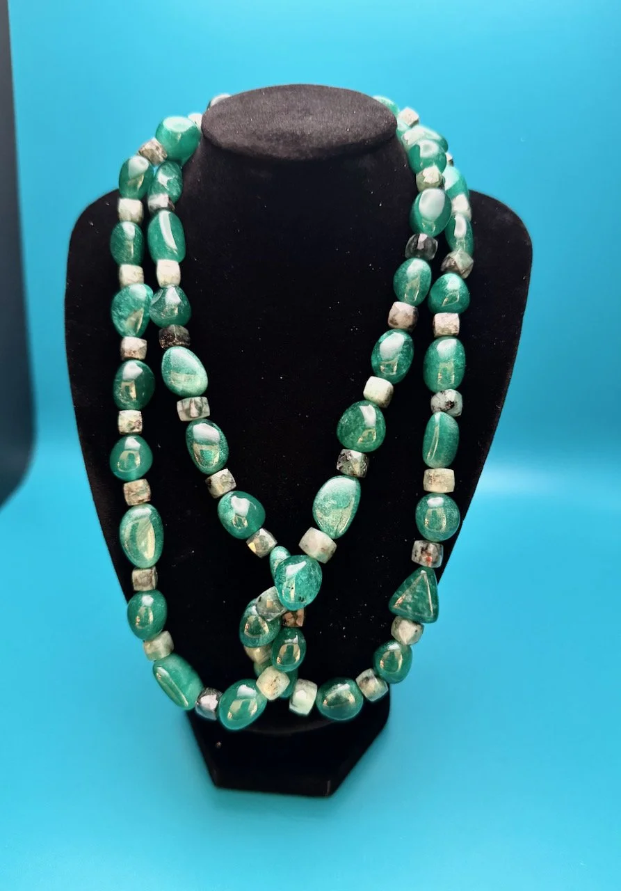 Zambian polished & raw emerald - 2.jpeg