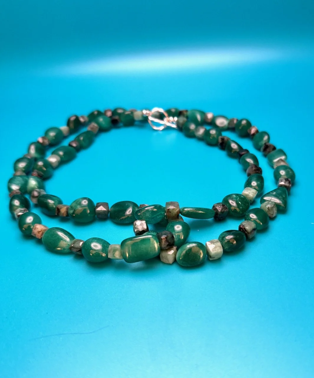 Zambian polished & raw emerald - 1.jpeg
