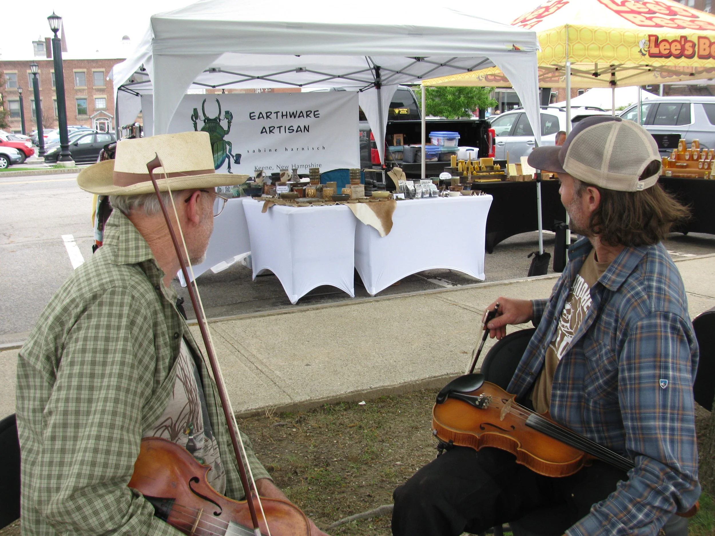 Violinists at Keene farmers checking out my booth. 