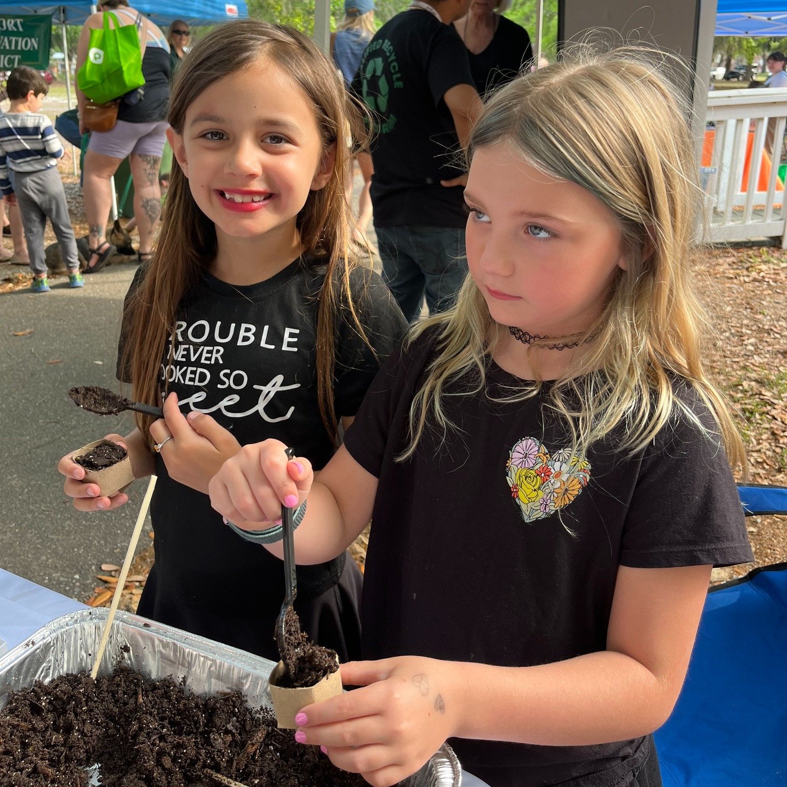 We celebrated Earth Day at the Port Royal Farmer's Market by hosting a 'make your own seedling cup' table using cardboard toilet paper rolls. 

Make your own: Cut and crease the rolls, make 4 slits to create flaps, fold flaps over starting on left, t