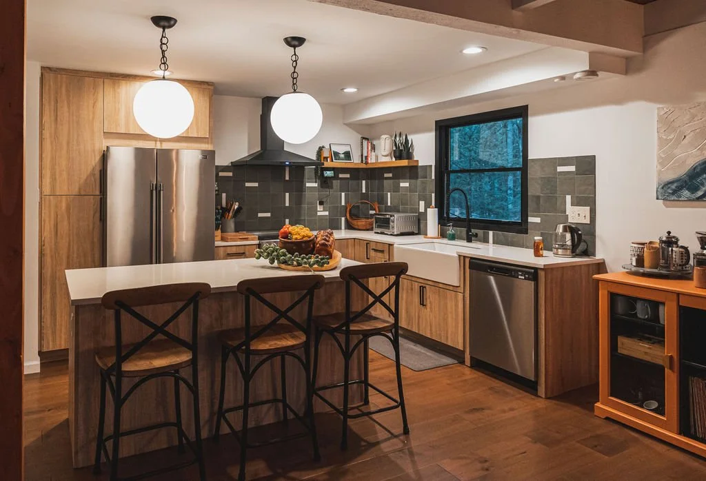 modern kitchen with island and appliances of casa la luz located in Poconos Pennsylvania
