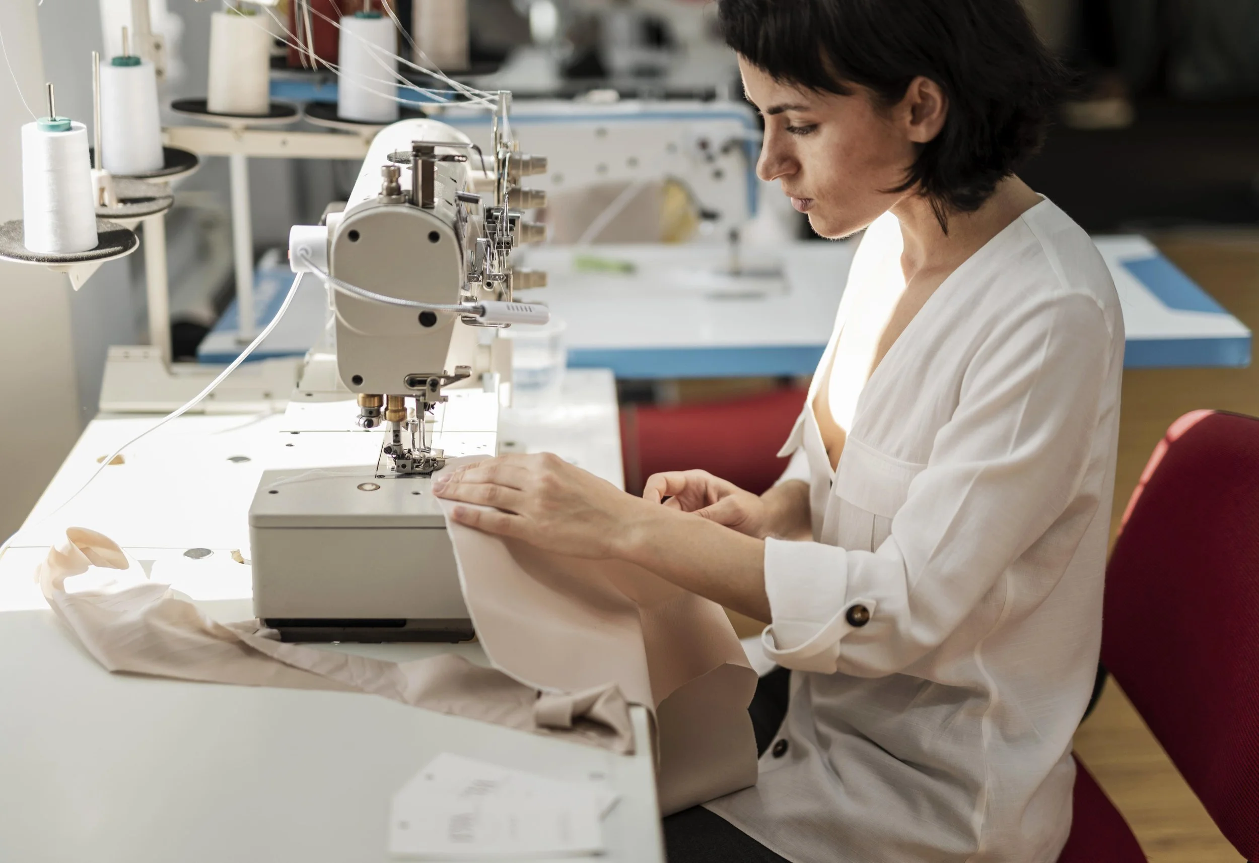 woman-working-with-sewing-machine (1).jpg