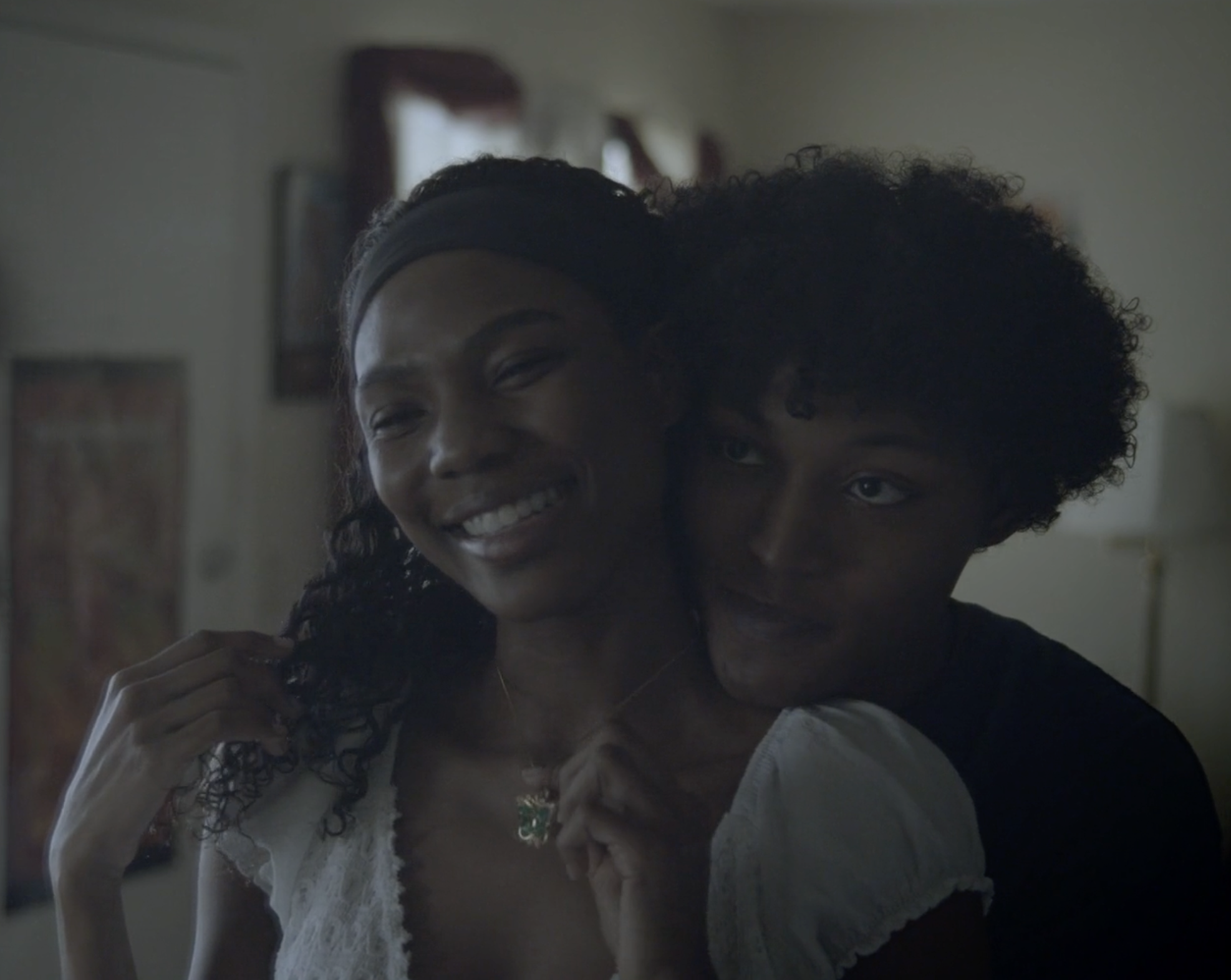 Opening scene: Springtime; Kemi wears a white crochet dress with puffed sleeves