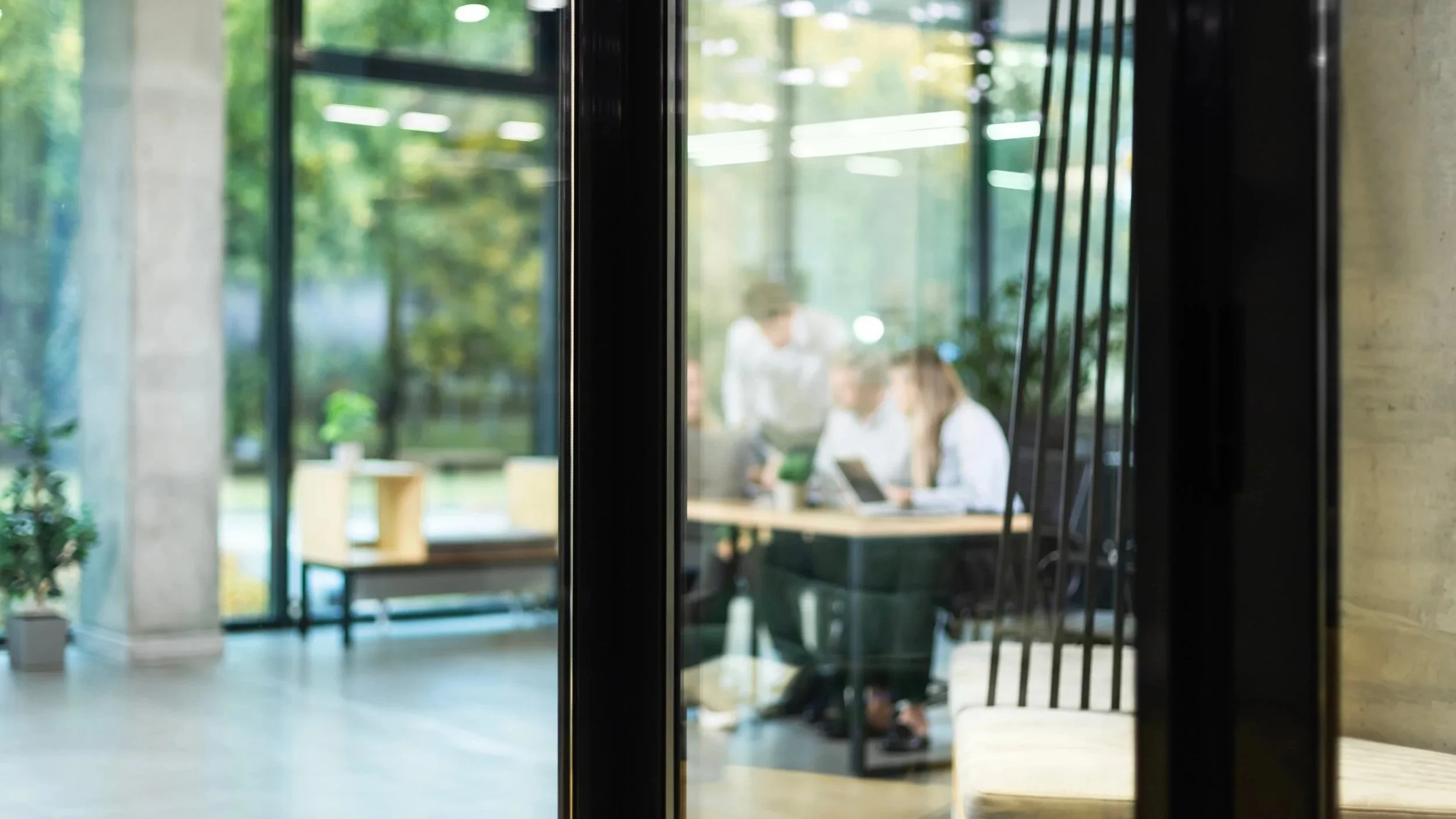 People working in office out of focus