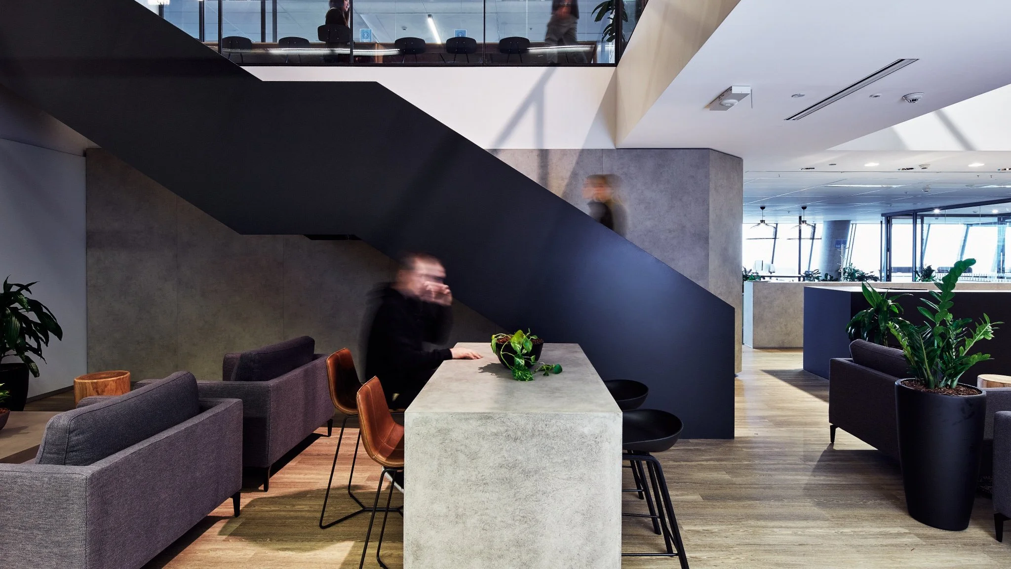 Downstairs level showing workers using the space