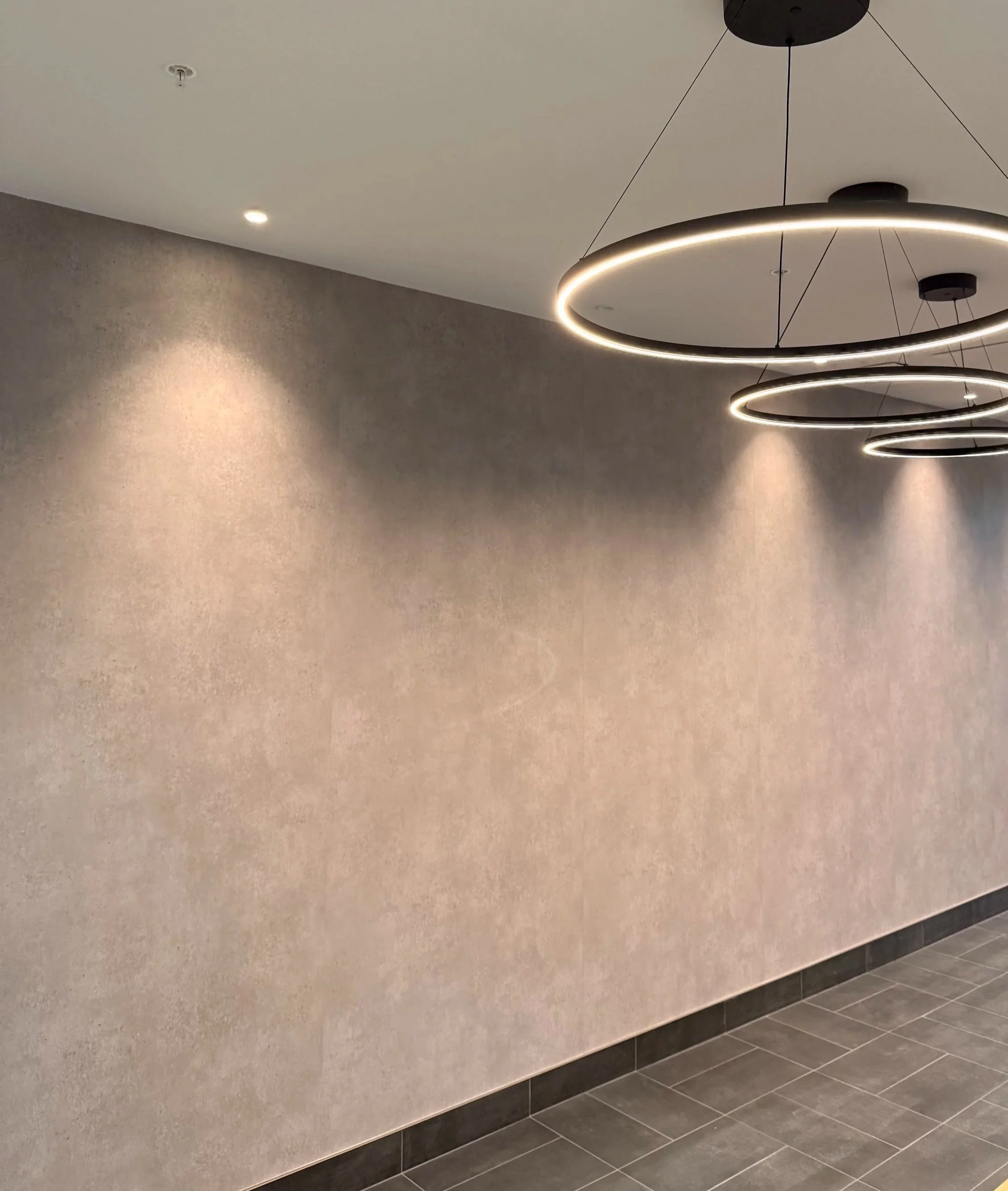Vinyl film installed on wall in condo building build. Commercial project completed in Kelowna, BC