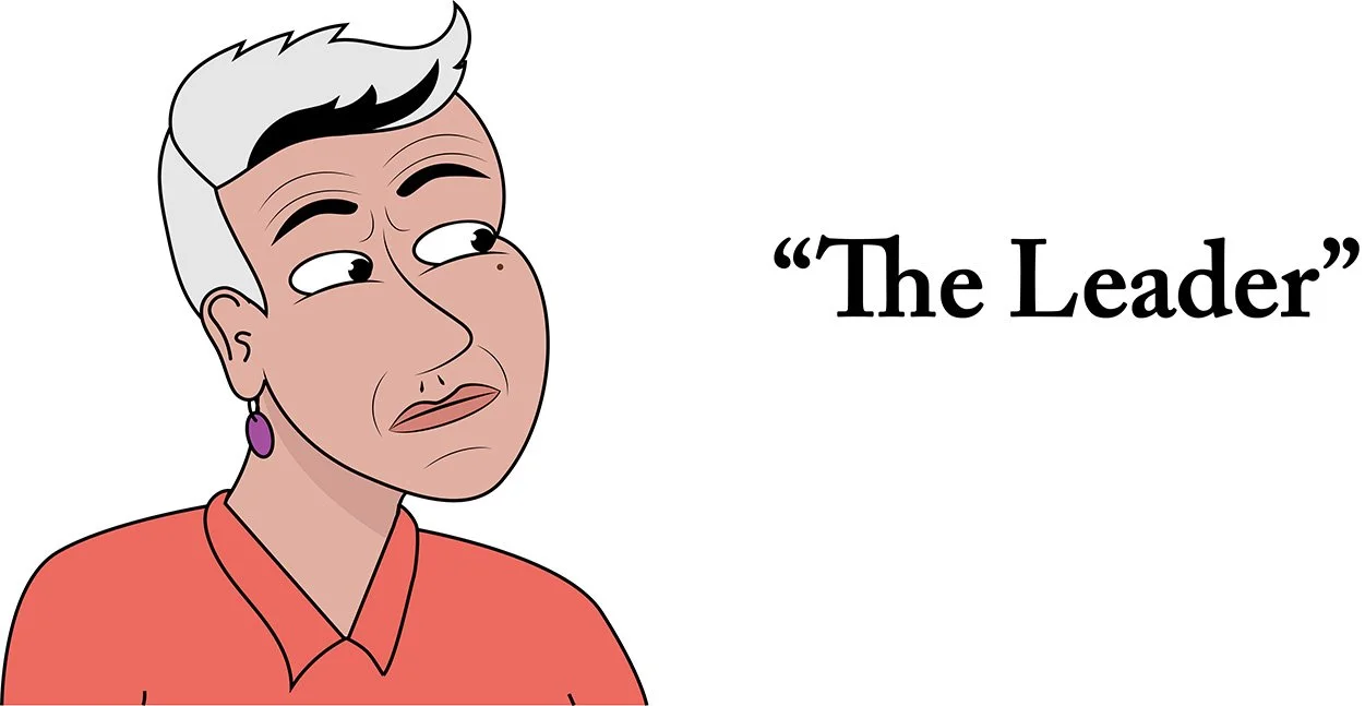 A cartoon image of Dr Josie McLean looking at  the words "The Leader". She has her eyebrows raised and is looking at the words as though she is trying to size them up. She wears an orange top and bright purple earrings.