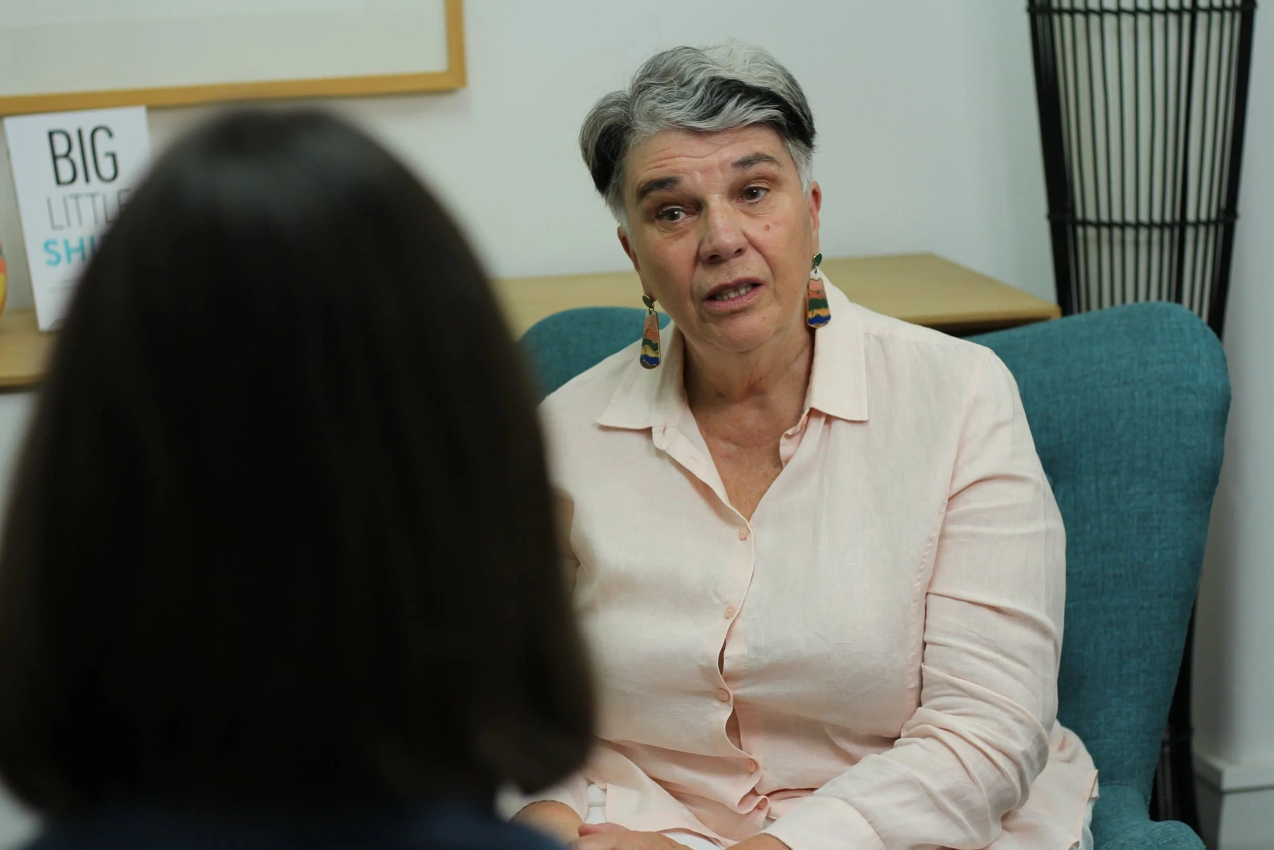 A photo of Dr Josie McLean having a Difficult Conversation with a client