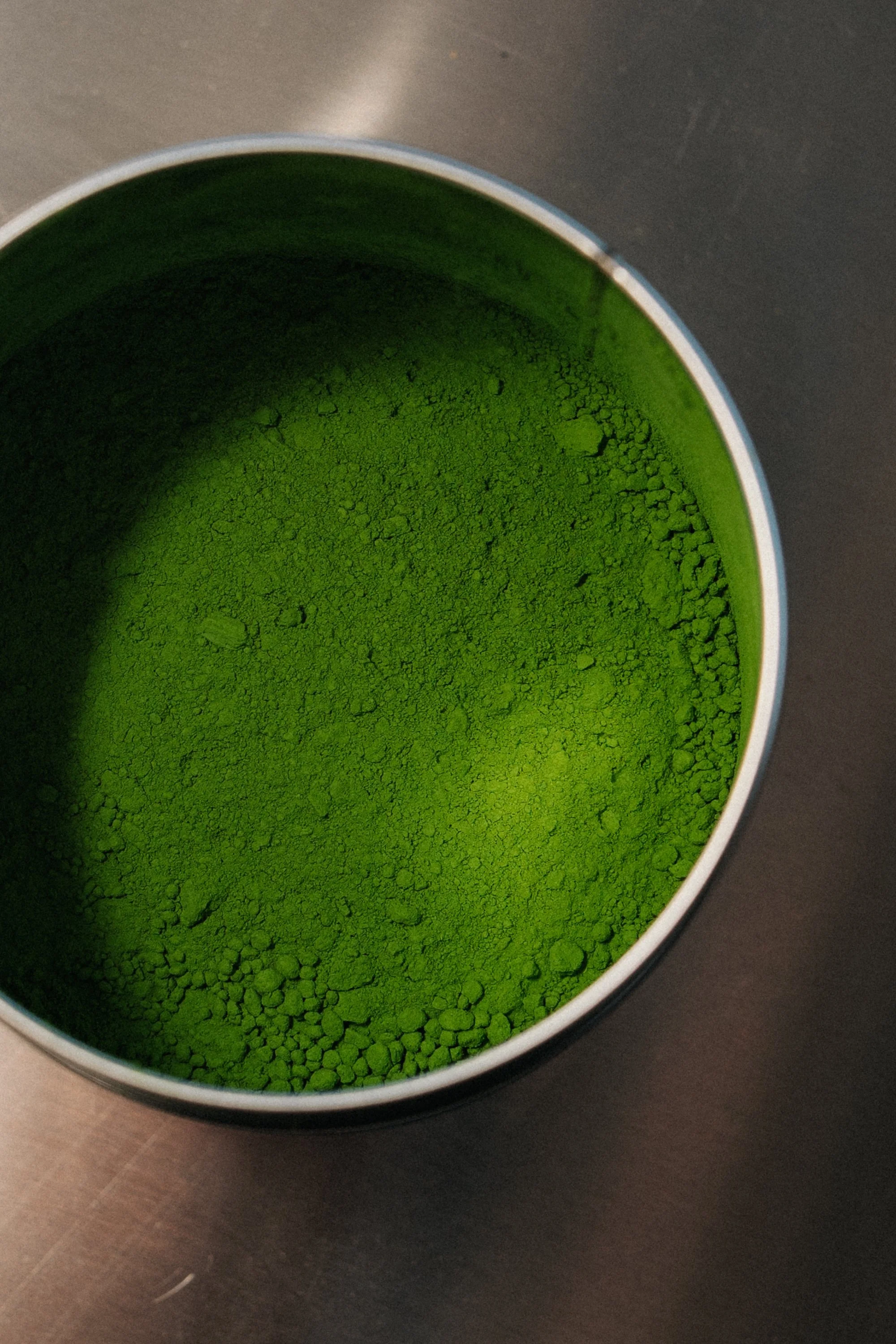 Image of open canister of Zenergi matcha limited release powder