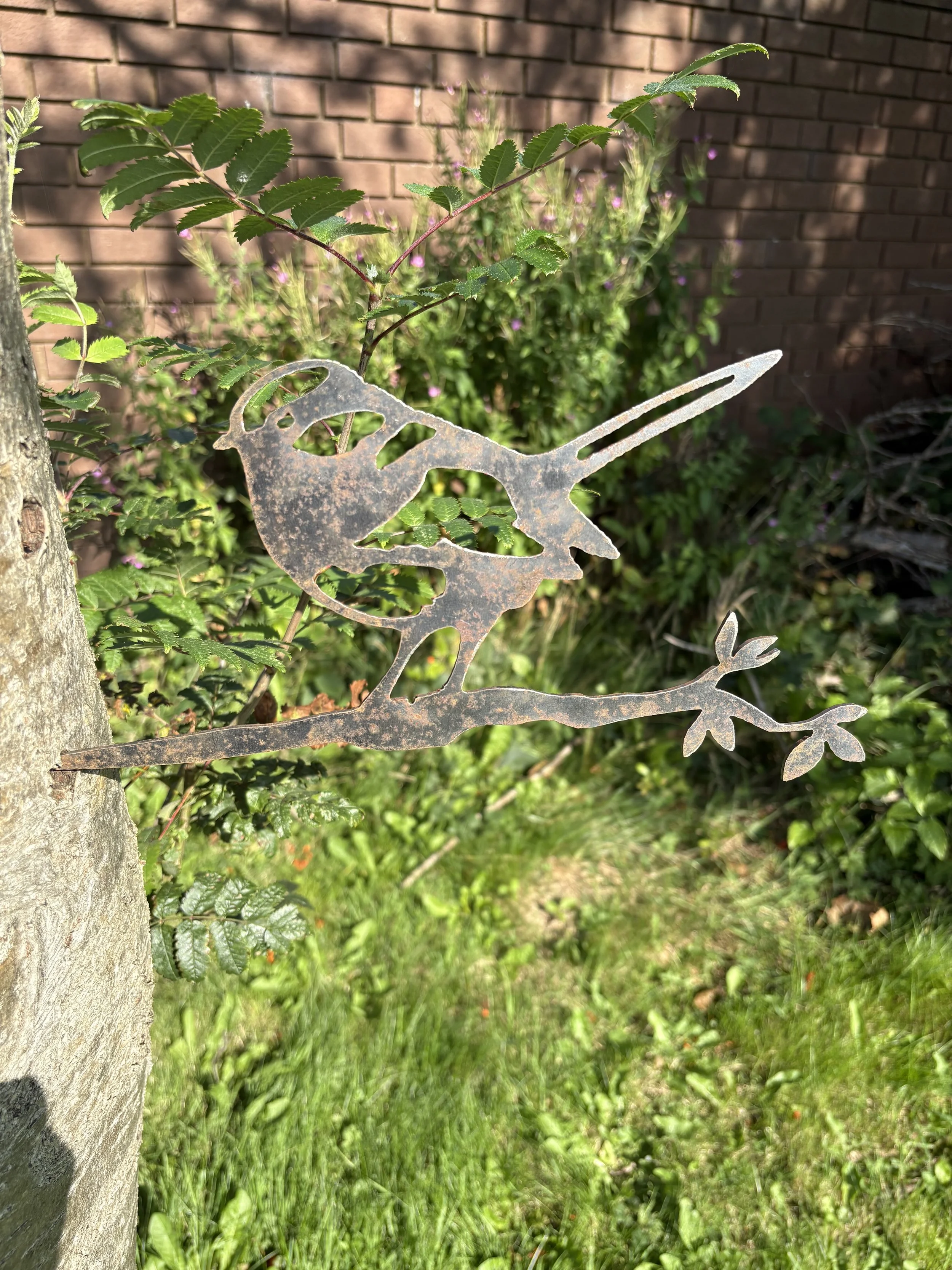 Steel blue tit on twig garden art, supplied bare to rust beautifully—includes spike for easy display in soil, wood, or planters.