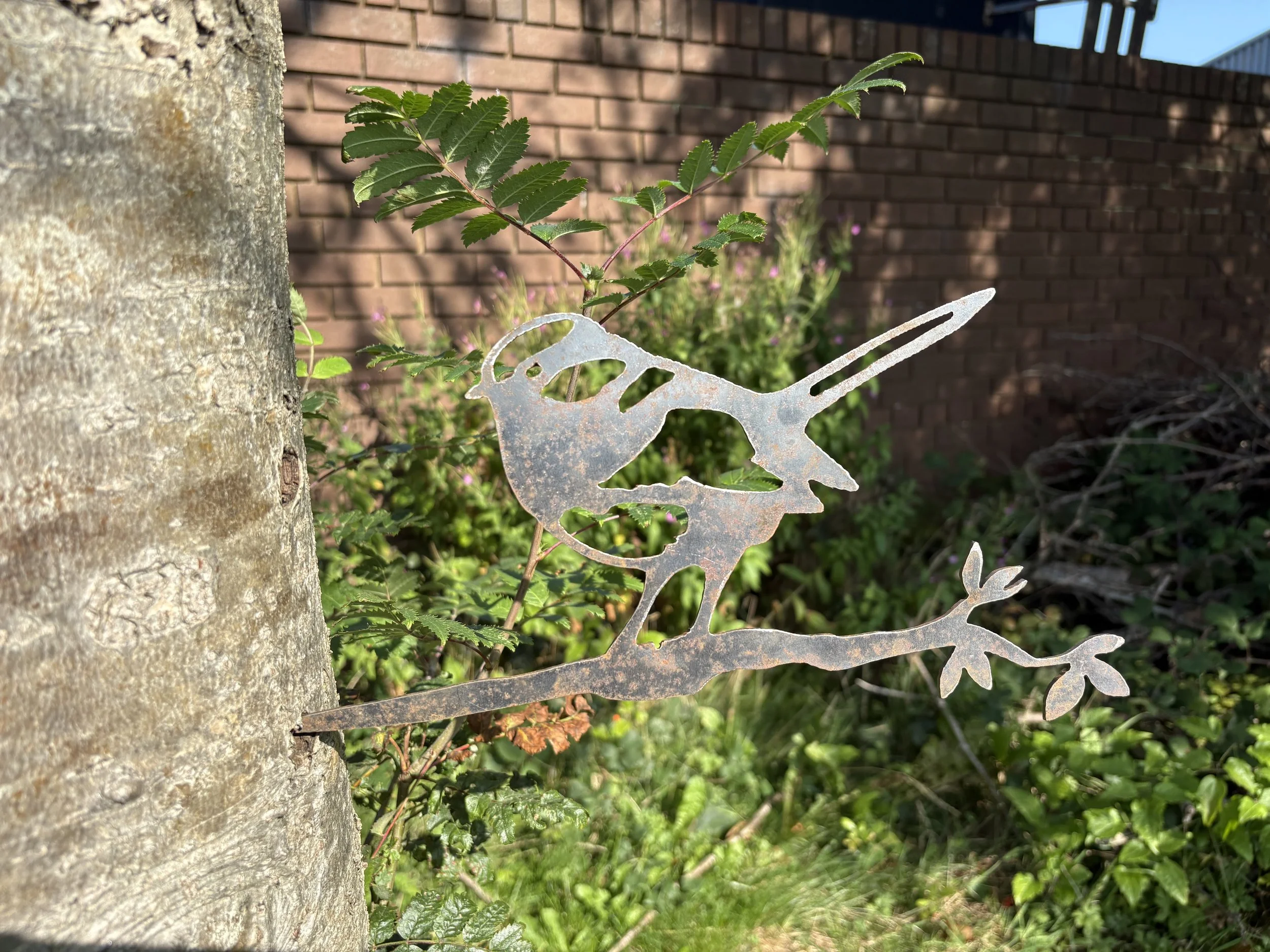 Rustic silhouette of a blue tit on a twig in mild steel—weather-ready and maintenance-free, perfect for garden fencing or posts.