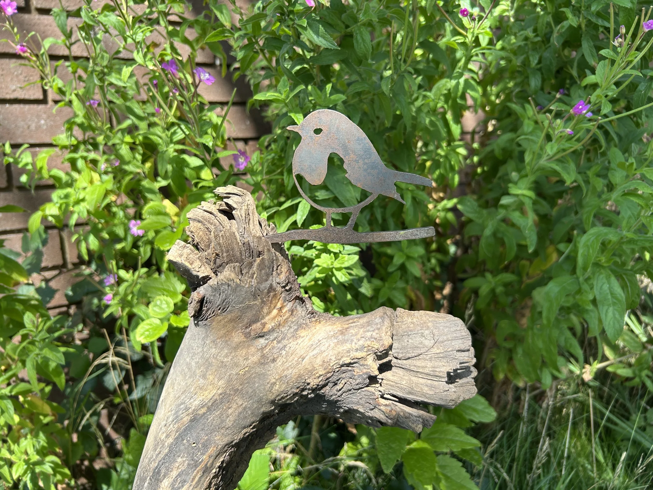 Garden art baby robin perched on twig, metal silhouette stands proud in flowerbeds and lawns, naturally ages (Copy)