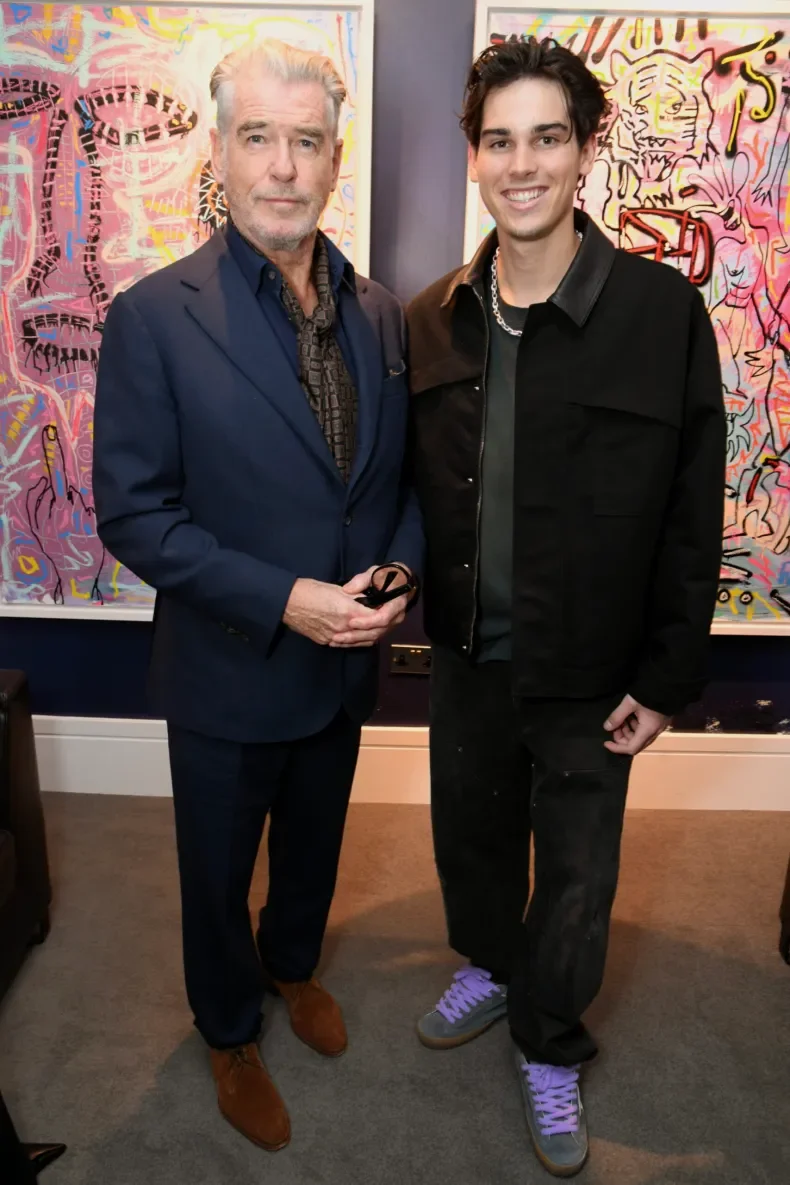 Paris Brosnan and Pierce Brosnan at the launch of Paris Brosnan's art collection in Mayfair, London, with music by RESIDENT.