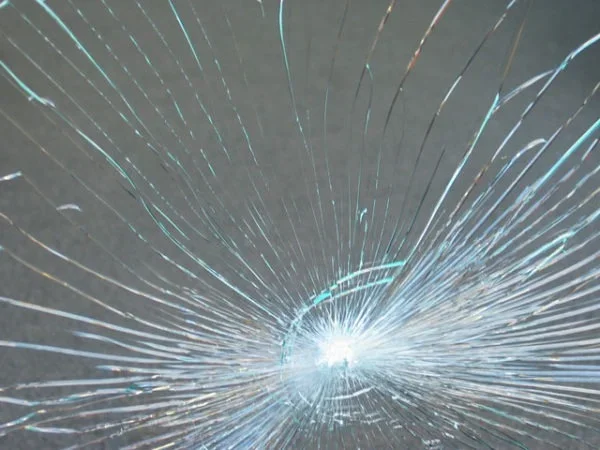 Laminated Security  glass in action graphic and example