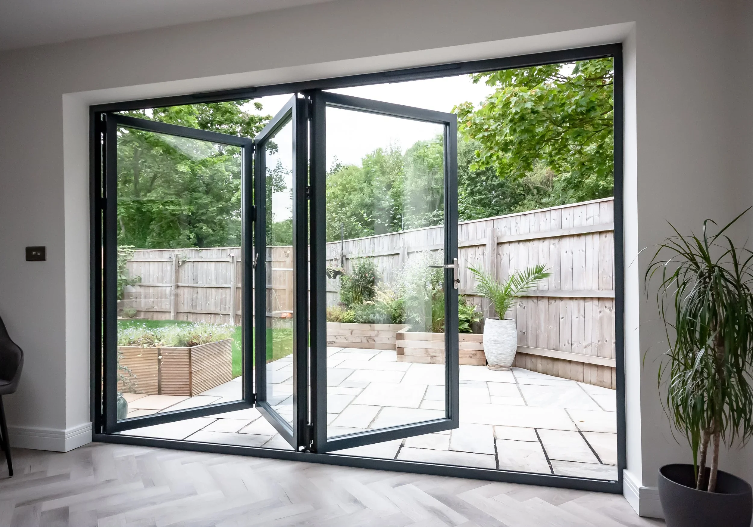 Sliding Bi-Fold Door Black Aluminium Open Garden