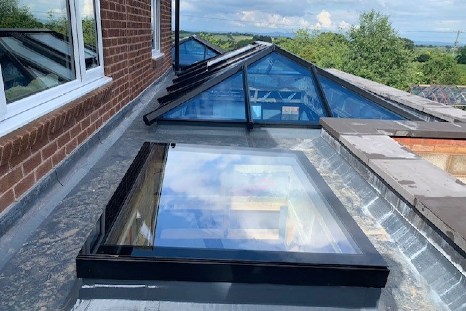 Skylight and roof lantern windows on a sunny day