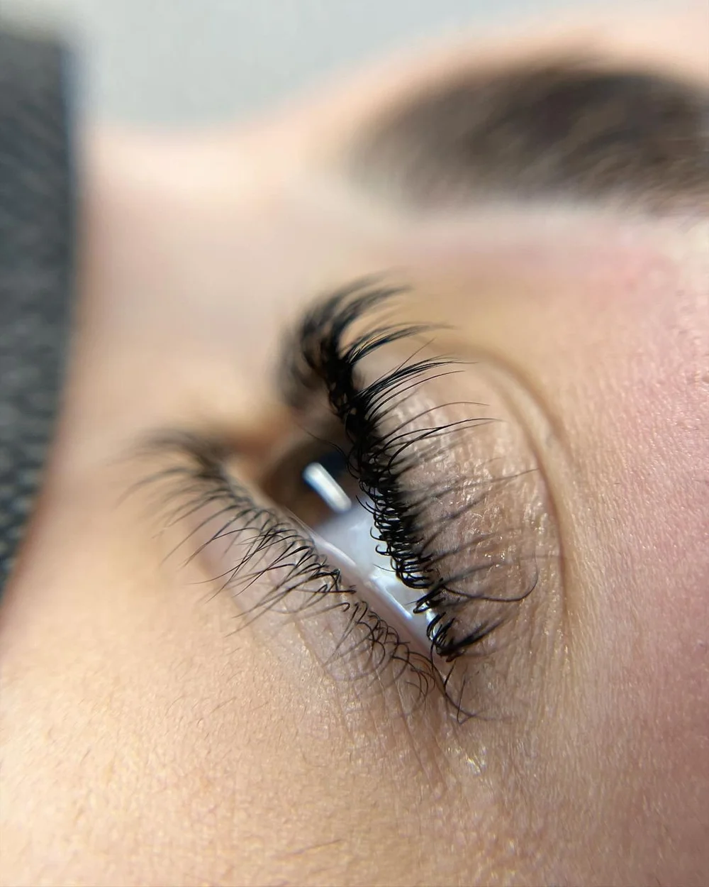 Lash tint result with darker, defined lashes