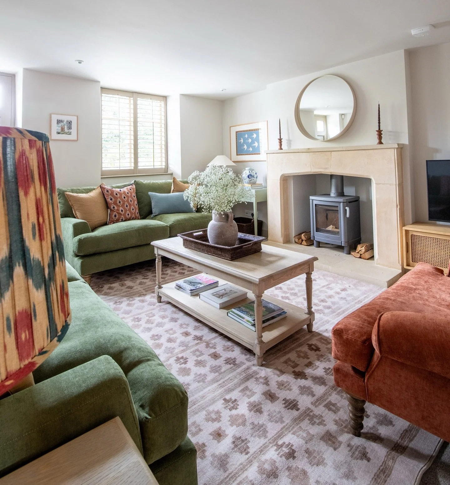 Introducing the Sitting Room at Project Stow, this was definitely our favourite room to design. We love the warming colour scheme, the soft layers and cosy seating. 

Fun fact: this house started off life as a pub! The door you see here was the pub&r