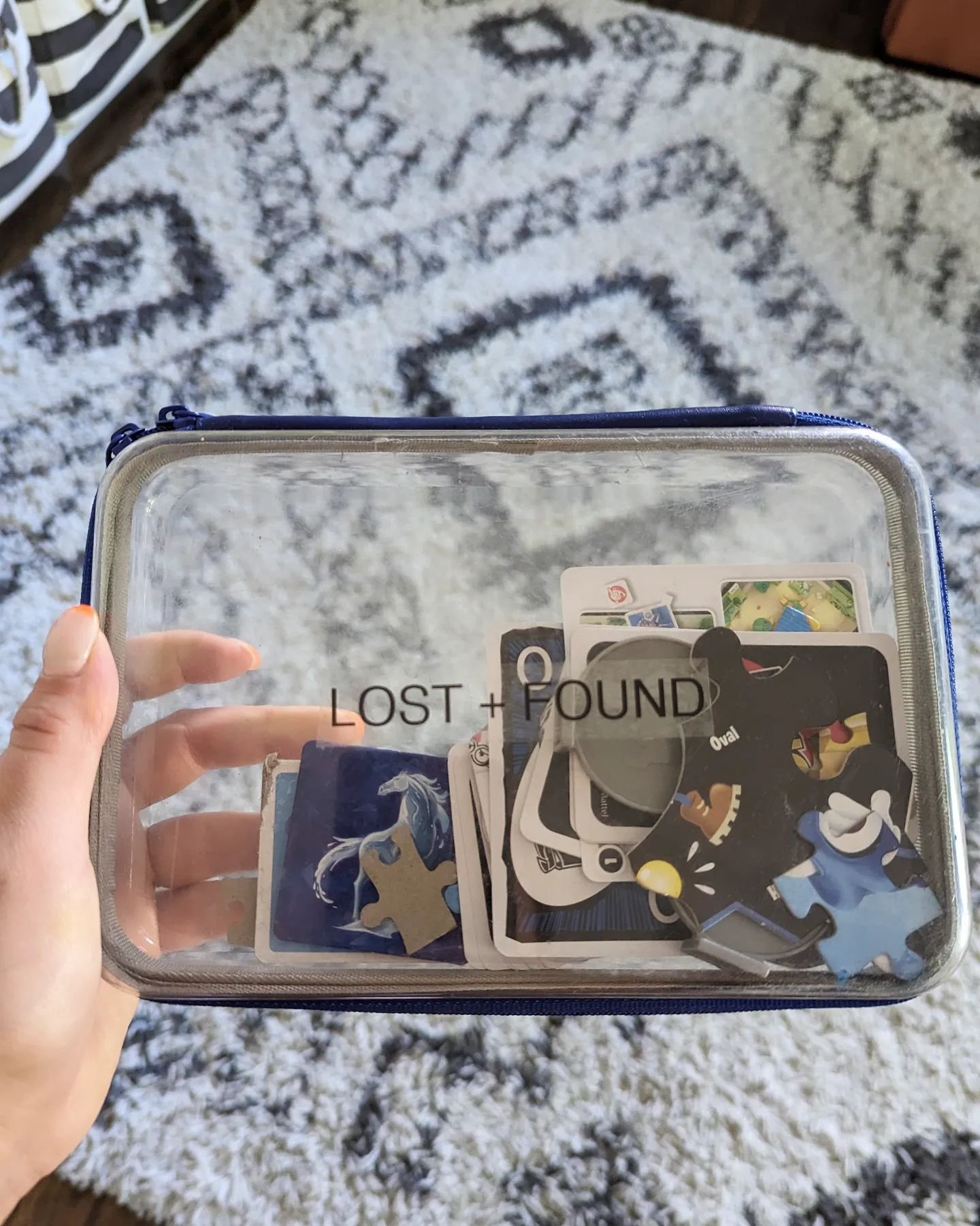 Parenting hack: Instead of taking the time putting away (or if we're being honest, tossing!) every stray game + puzzle piece we find around the house, create a 'lost and found' box for them! I started this during my nanny days, and the kids loved it.