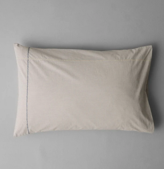 <a target="_blank" rel="noopener noreferrer" href="https://us.toa.st/collections/bed-linen/products/fine-stripe-organic-cotton-embroidered-pillowcase-ecru-smoke-blue">Stripe Embroidered Pillowcase</a>