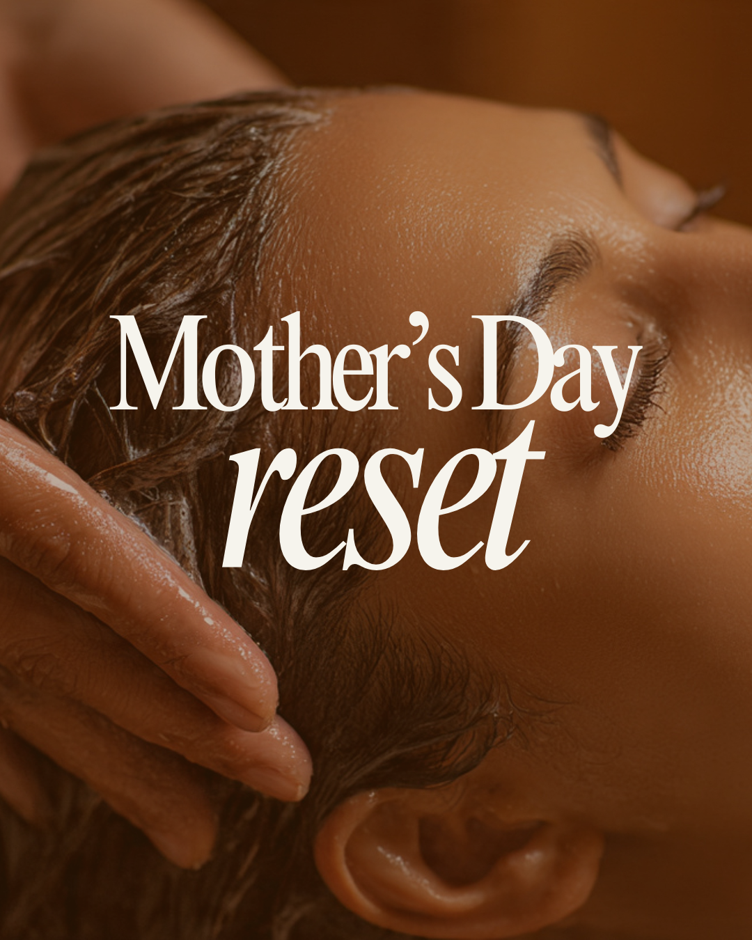 A woman receiving a relaxing scalp massage during a spa treatment, with the text 'Mother's Day reset' overlaying the image.