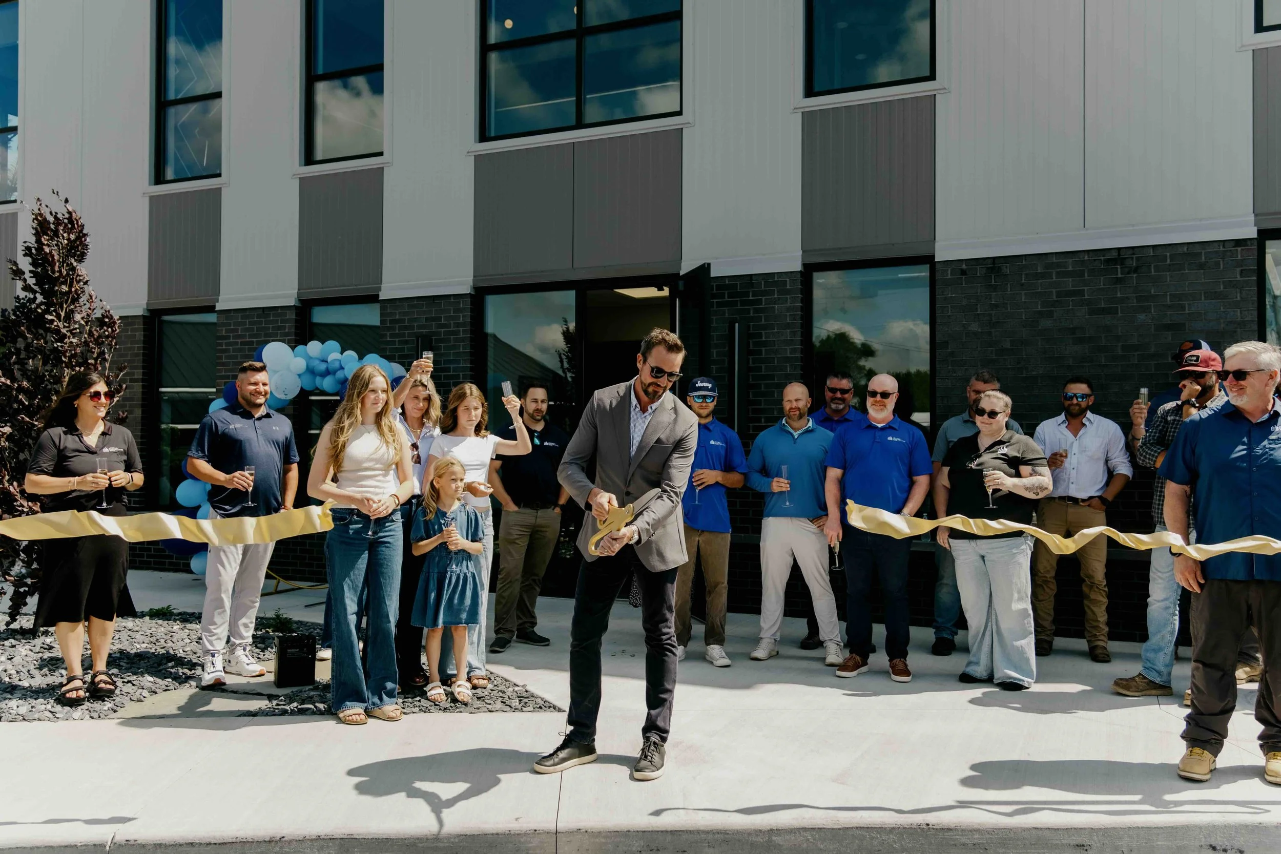 Construction group celebrates opening of new headquarters