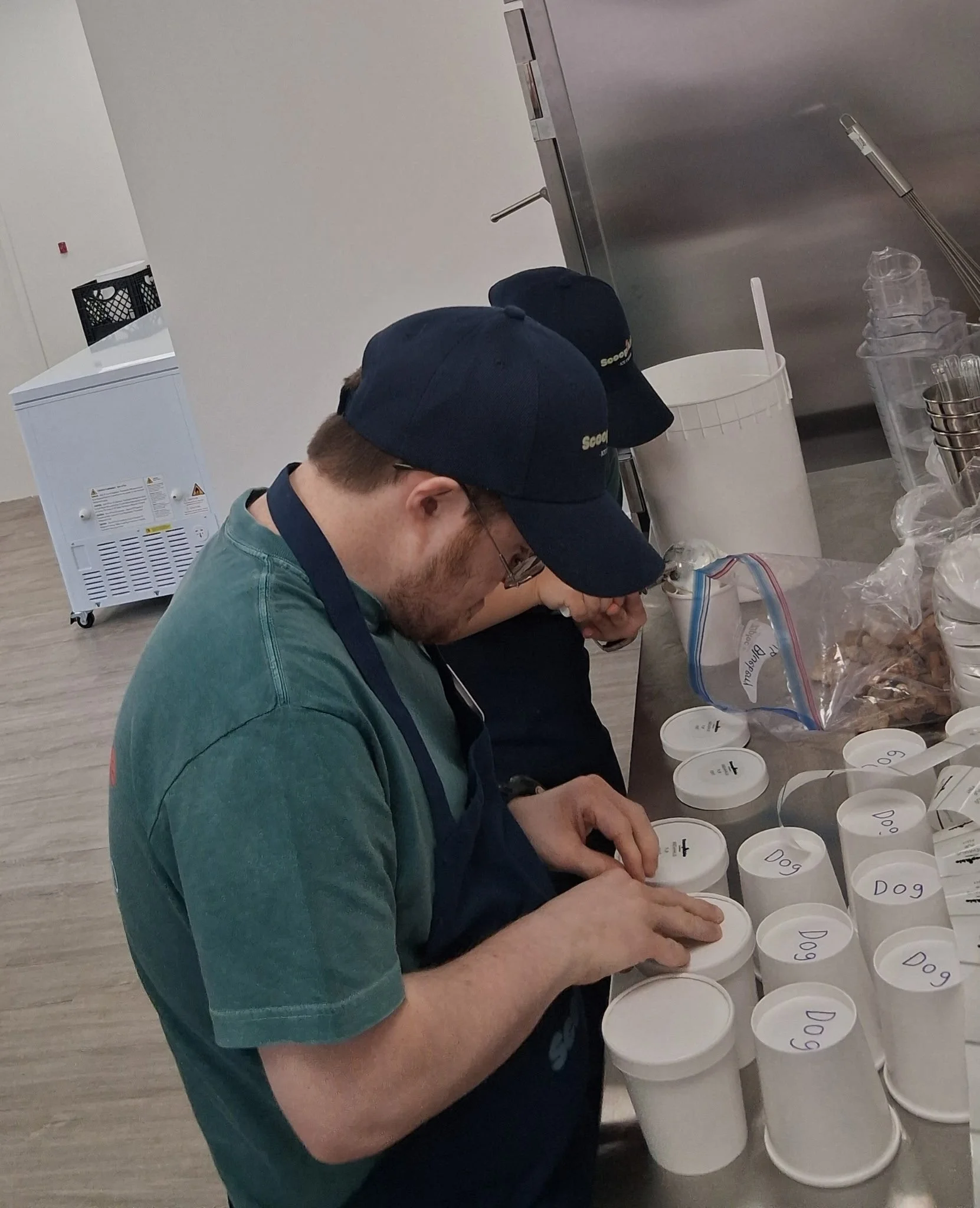 employees making icecream in house