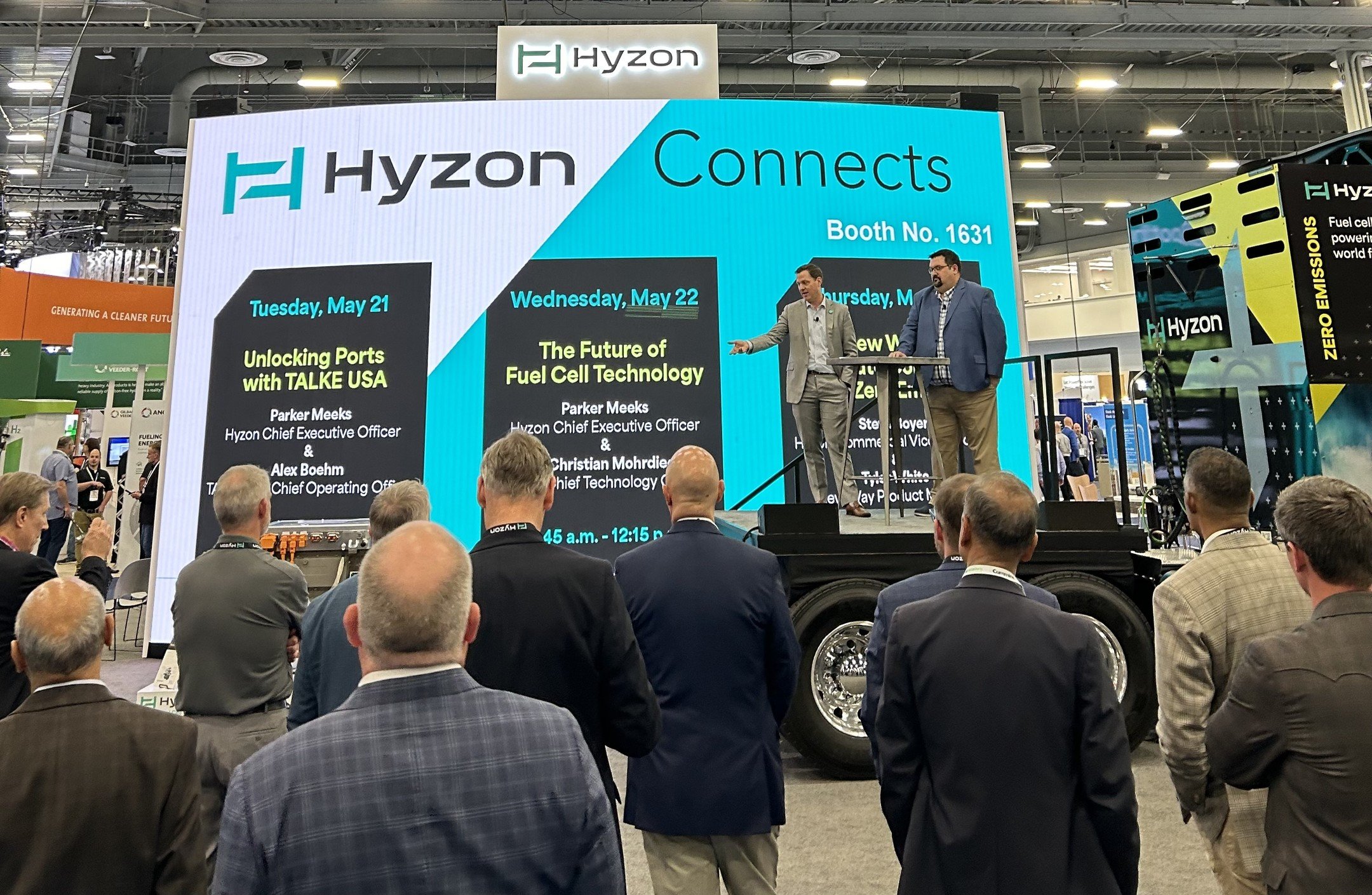 At today's Hyzon Connects at #ACTExpo, an extraordinary scene unfolded as Parker Meeks and Alex Boehm from @talkeusa took the stage uniquely set on the back of a Hyzon hydrogen-powered truck. Amid the hum of the bustling expo, they shared a compellin