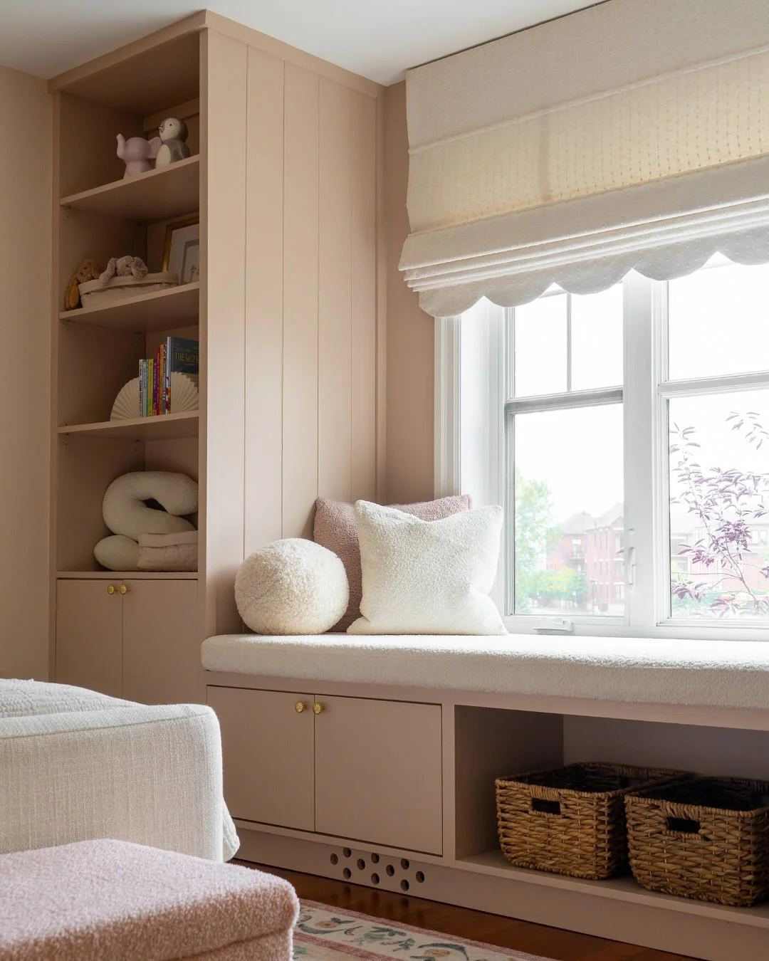 This space was so fun to bring to life. The custom scalloped Roman shade, shiplap details, vent holes in the millwork, and soft pink tones create a room this little princess can grow with. I had my own childhood dream room in mind while designing it,