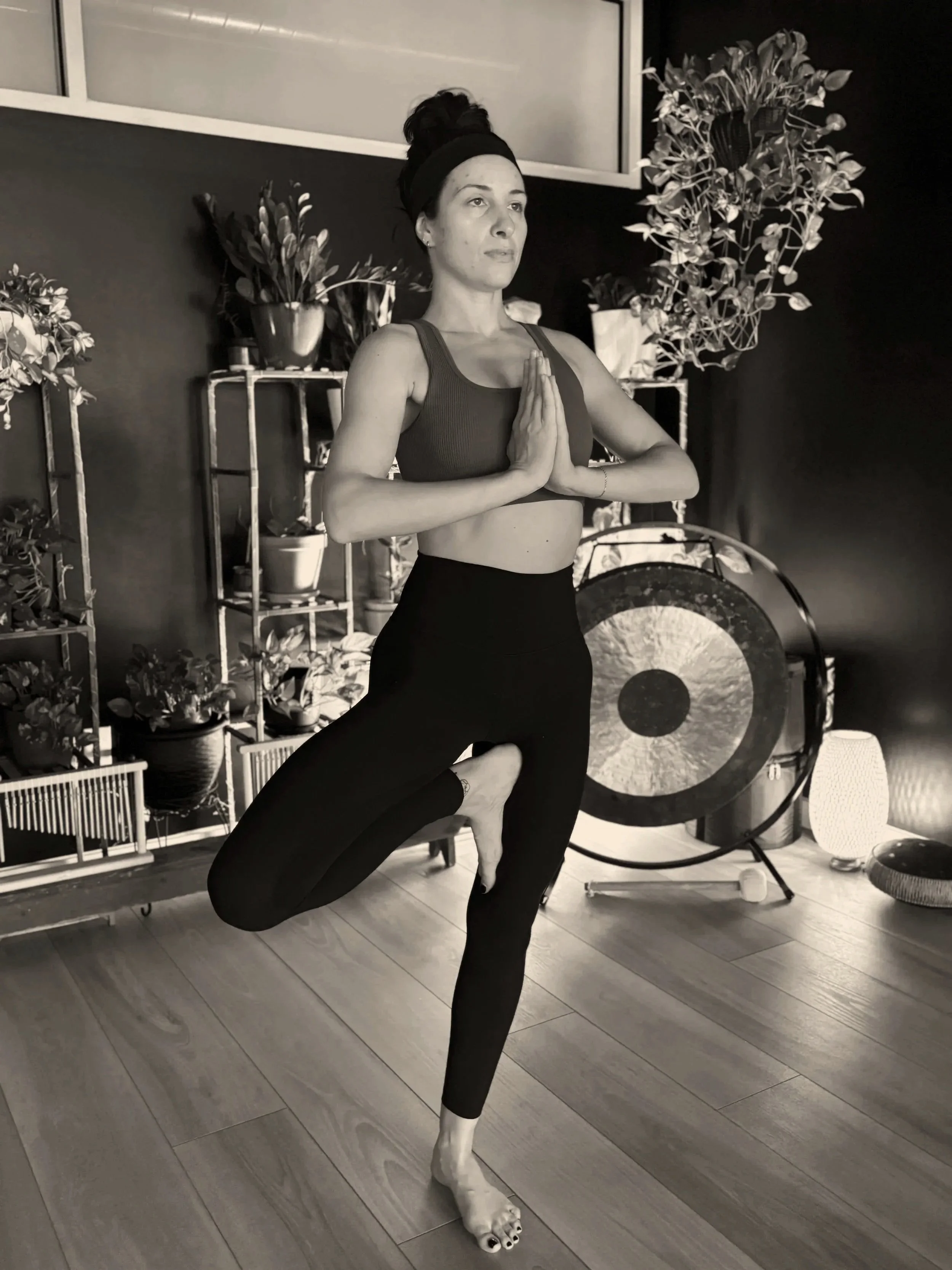 Yoga teacher in tree pose