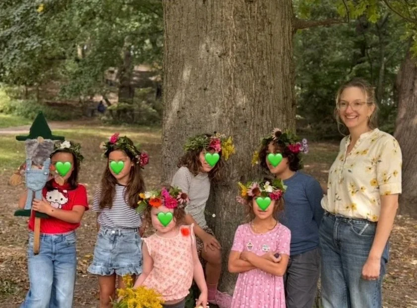 Green magic kids with their flower crowns and teacher, Catharine.