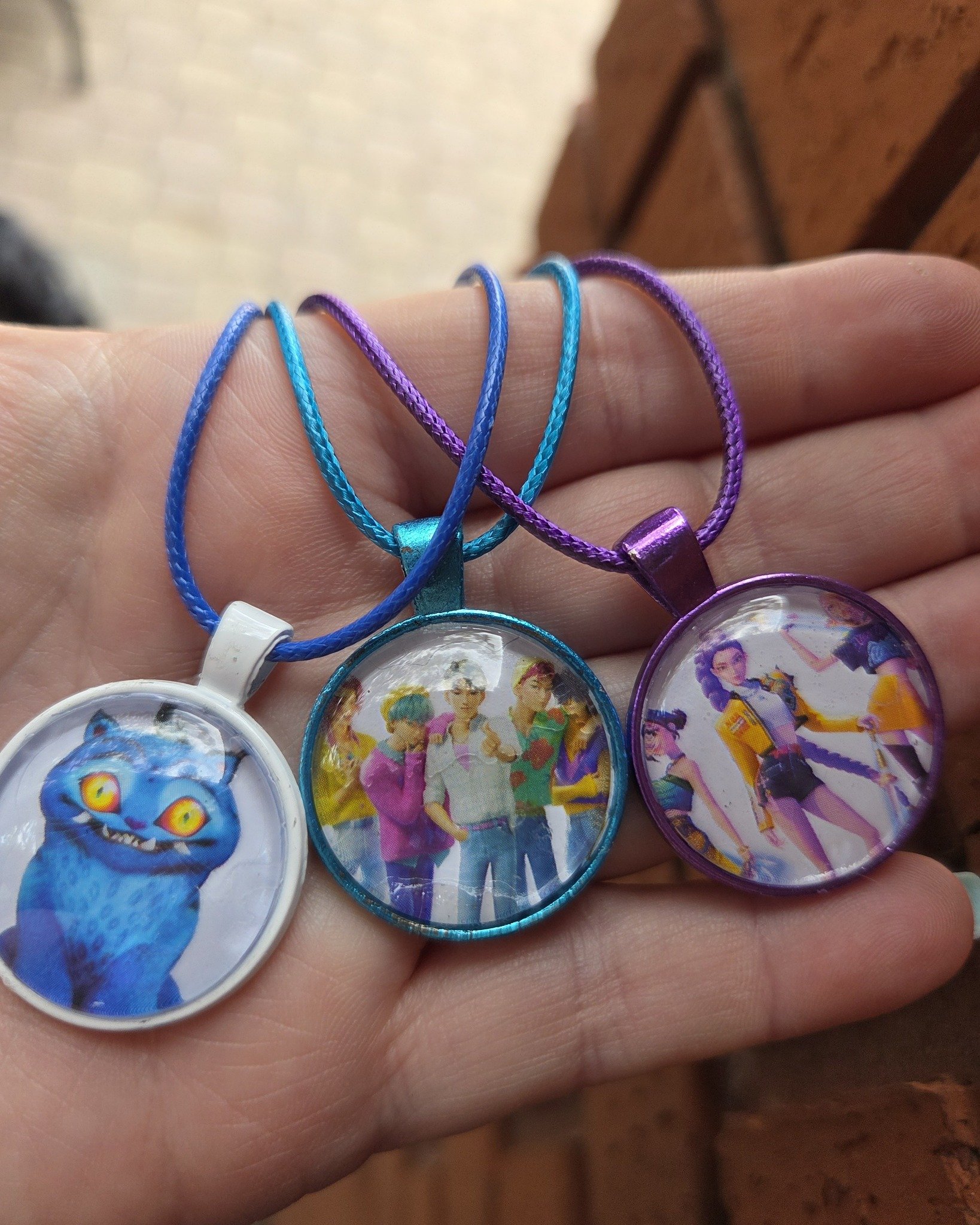 Any KPop Demon Hunter fans out there? I've got some new necklaces featuring some of your favorite characters! Supplies are limited. So get here quick! I'll be here at the @ybormarket until 1pm today!

 #handmade #jewelrydesigner #upcycledfashion #byl