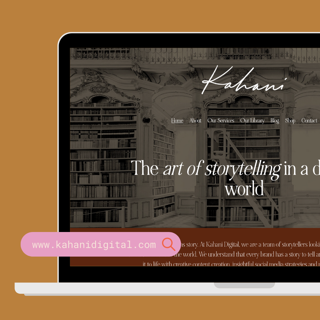 A laptop displaying a website for Kahani Digital with a header image of a grand library filled with books and ornate architectural details.