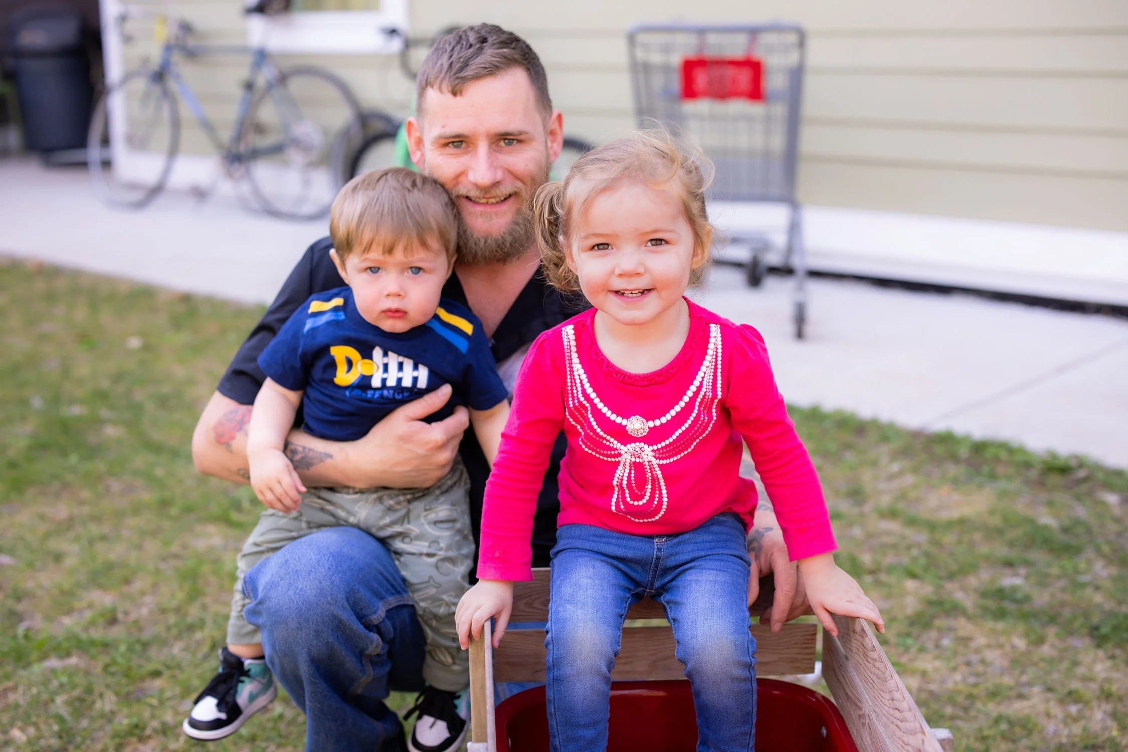 This father and his two children recently overcame homelessness with the help of New Hope for Families
