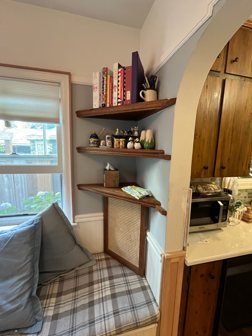 Solid oak corner shelves and electronics hutch with cane webbing. Custom oak profile and proprietary aged finish.