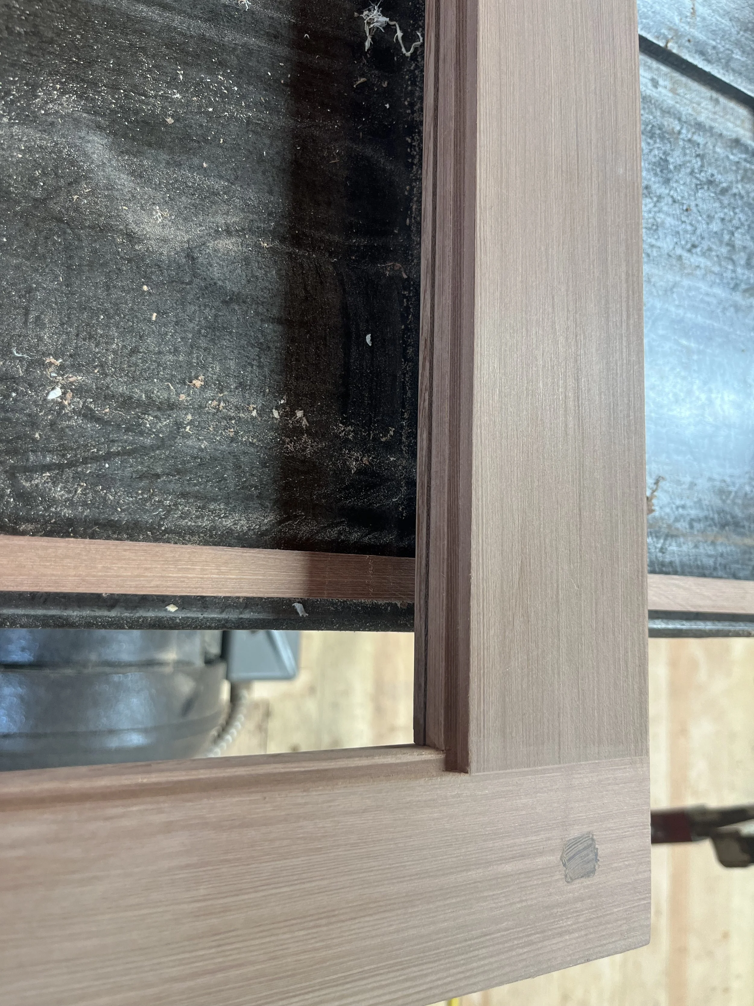 Wood pinned sash joinery. No glue is used, permitting easy repair in a century or two.