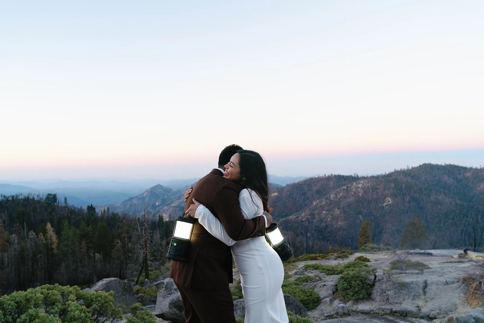 Bride and groom hug at their Sequoia elopement
