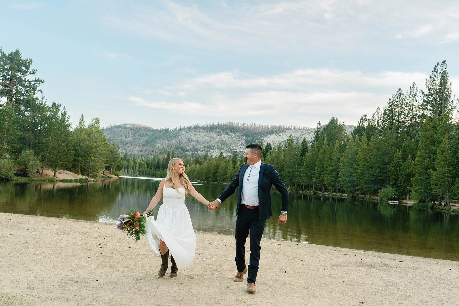 Couple holds hands at their Lake Tahoe elopement