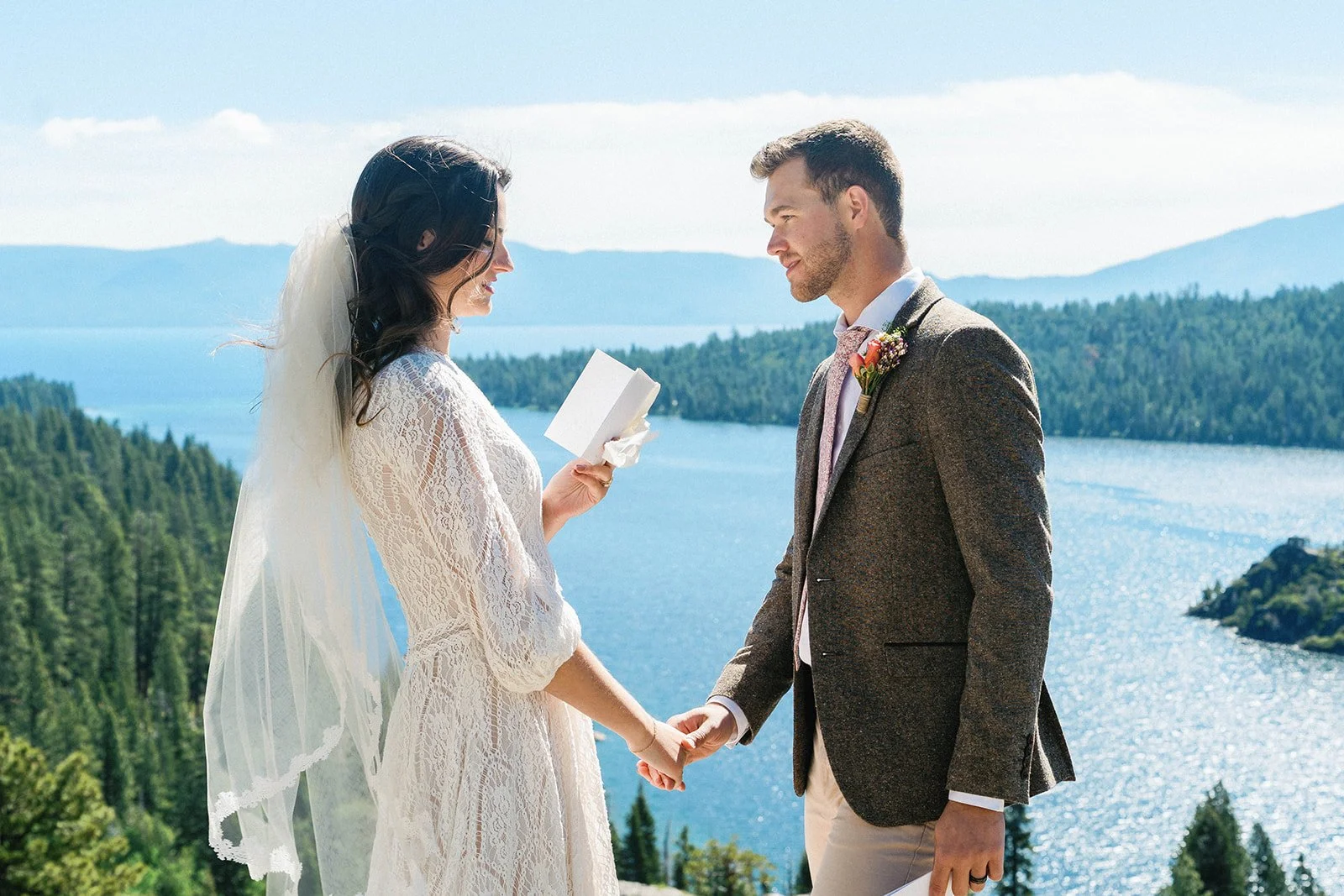 Bride and groom say vows at their Emerald Bay elopement ceremony