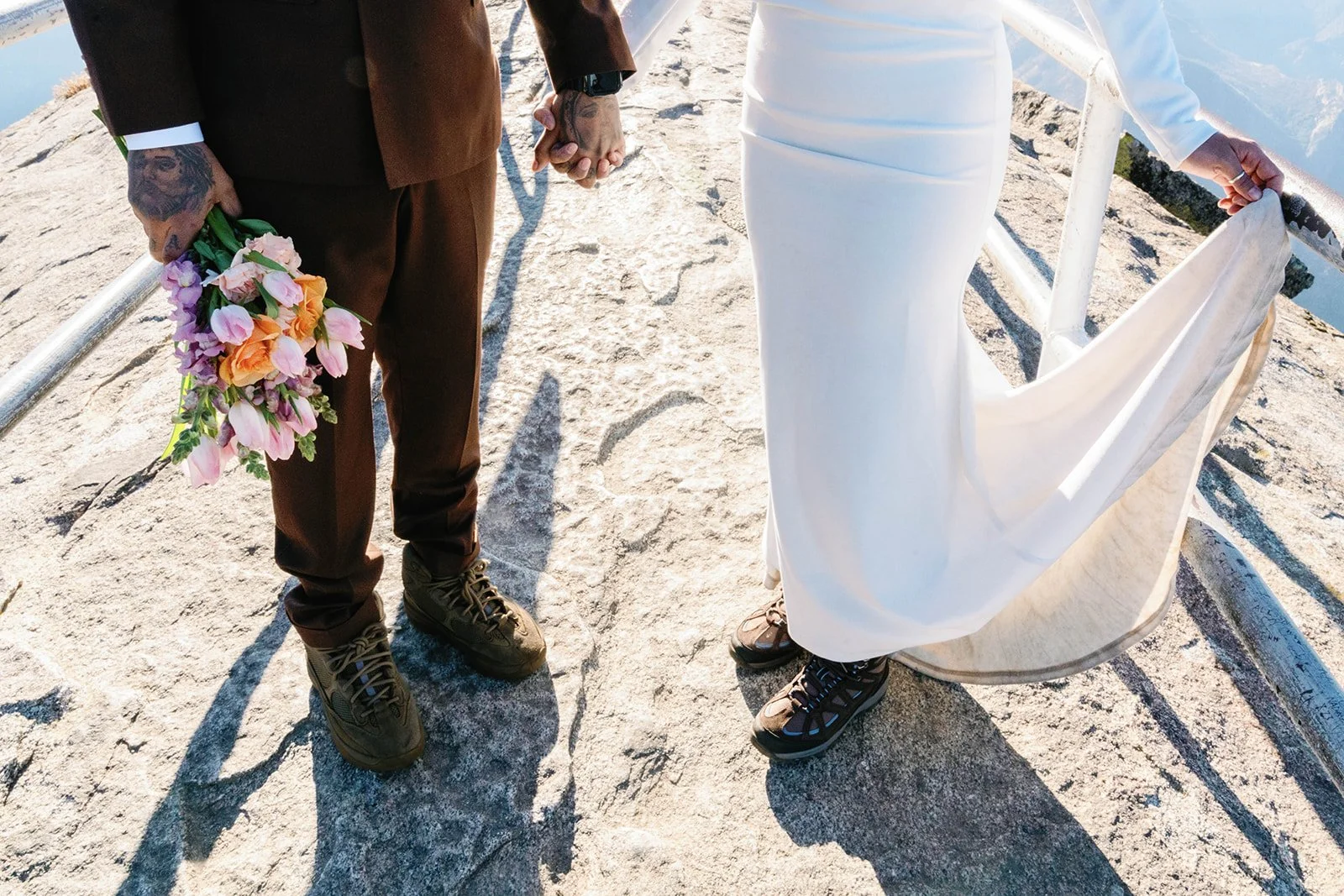 Couple in hiking boots at their Sequoia elopement