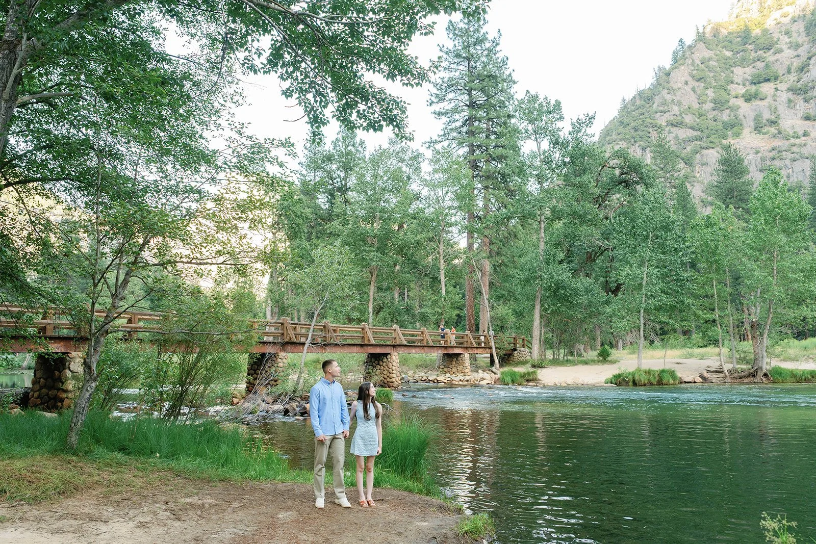 Couple takes in the views during their Yosemite engagement session