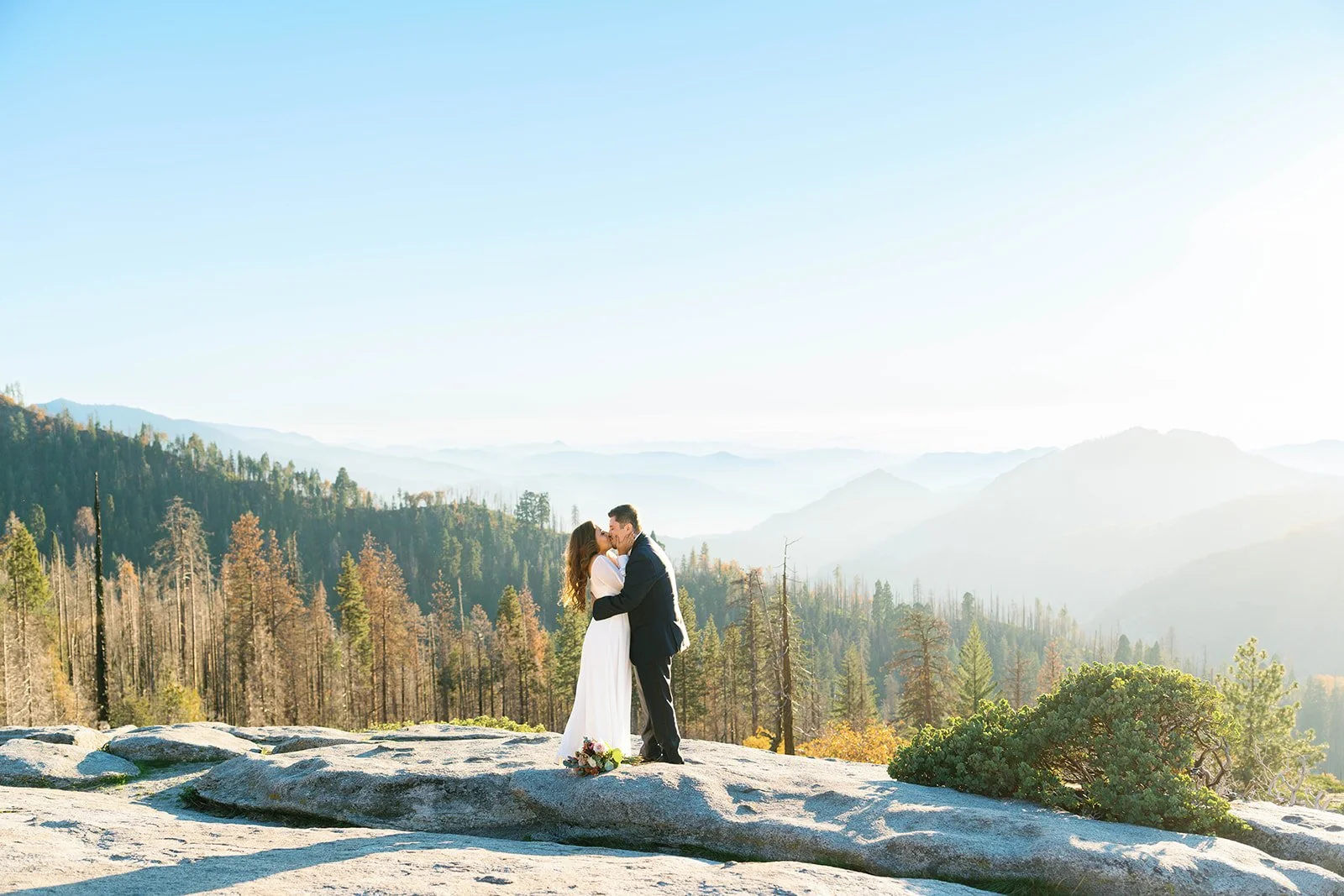 Couple kisses at their Beetle Rock elopement ceremony