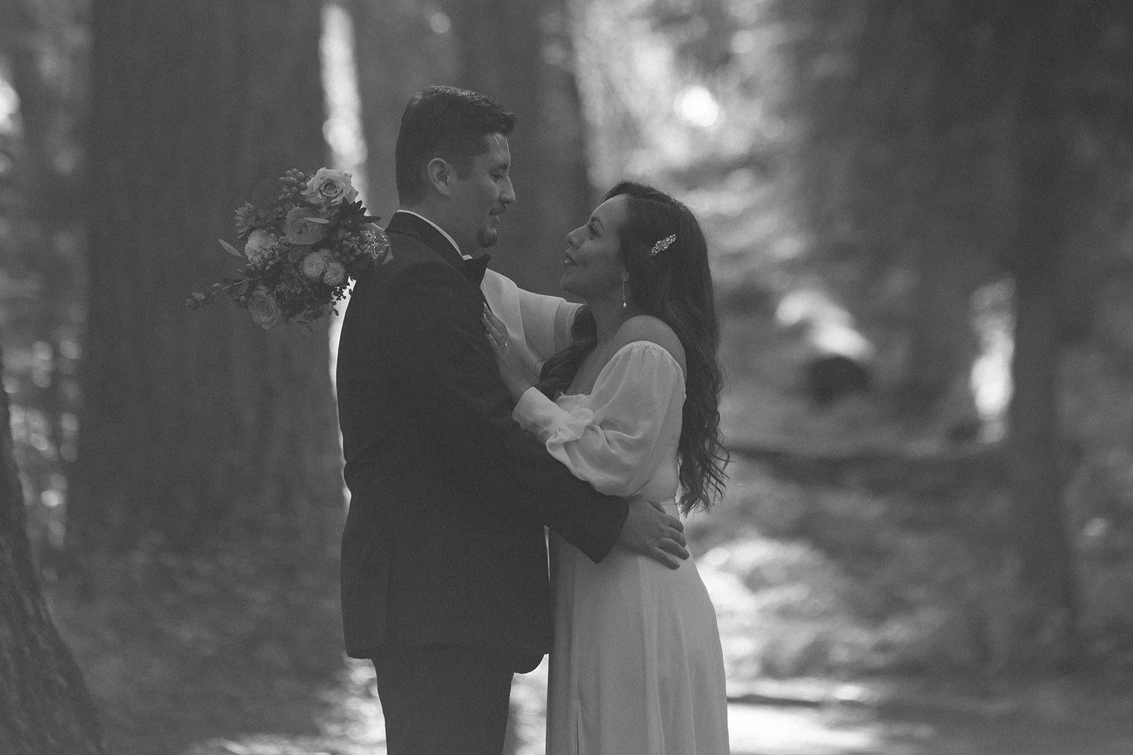 Couple embraces at their Beetle Rock elopement ceremony