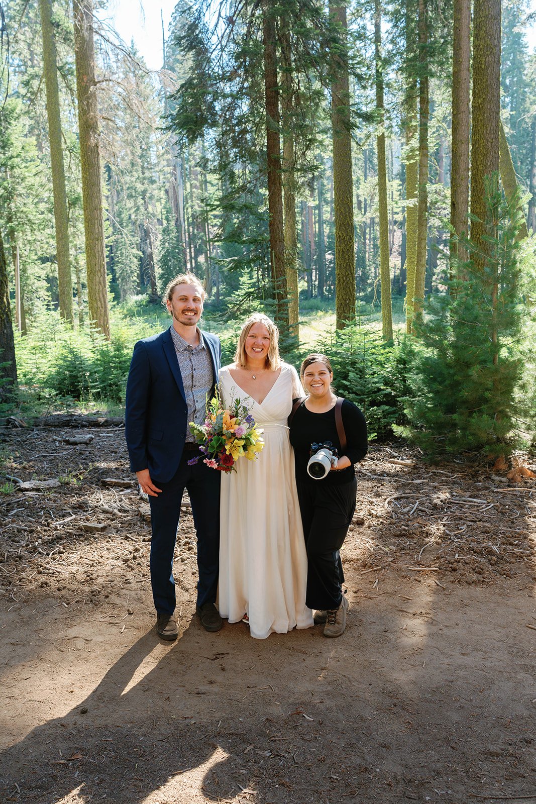 Bride and groom with their adventure elopement photographer