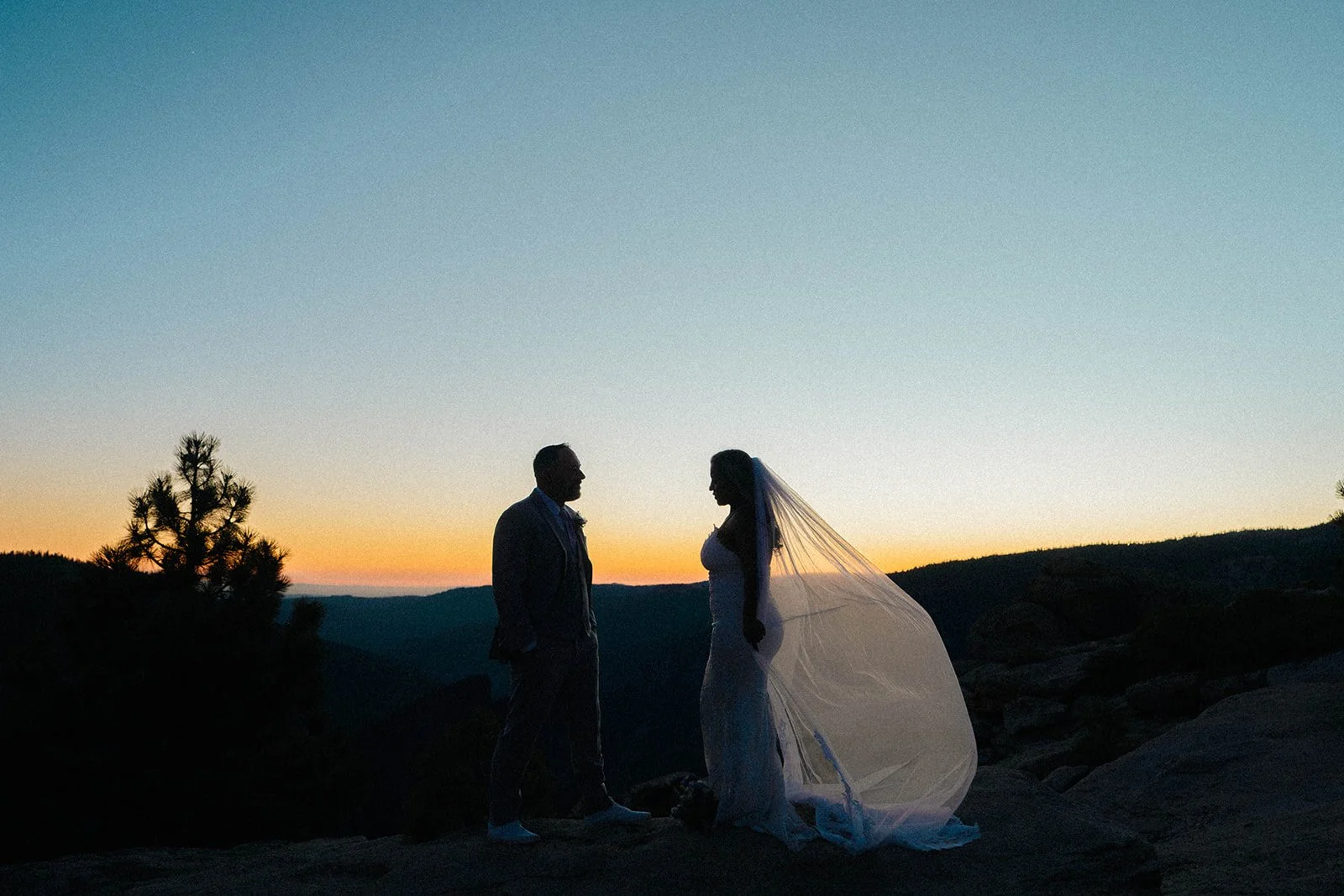 Bride and groom at sunset during their Yosemite weekend elopement
