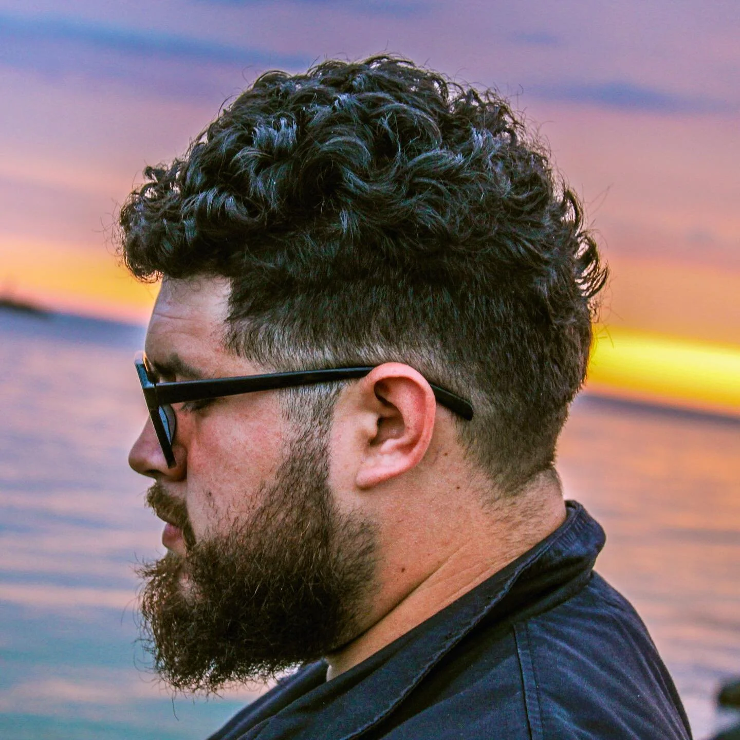 Side profile portrait at the beach