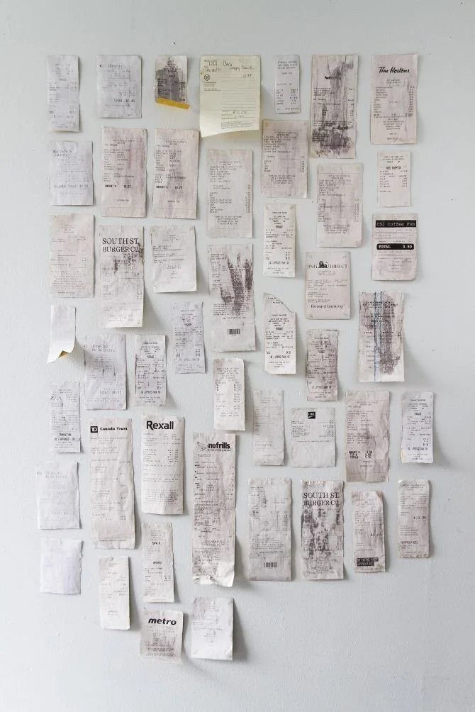 A wall of receipts