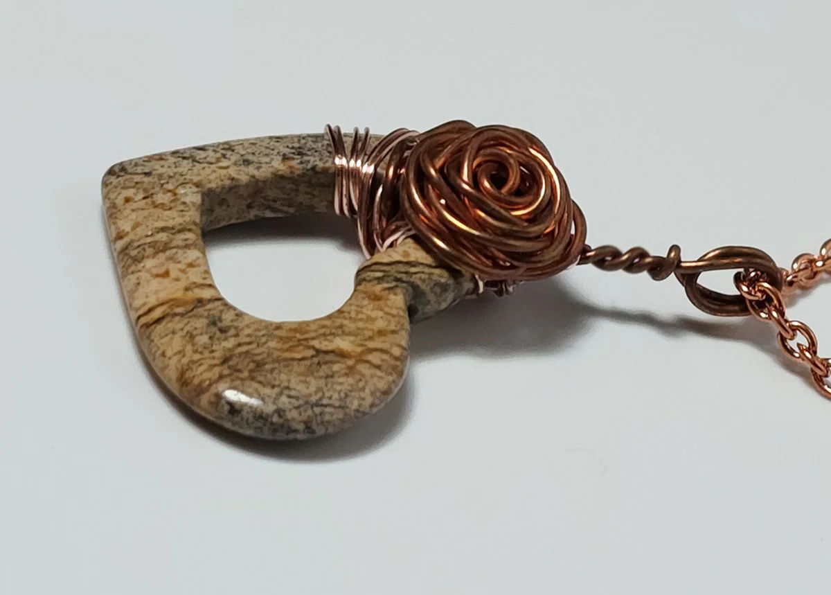 Rose open heart jasper right side.jpg